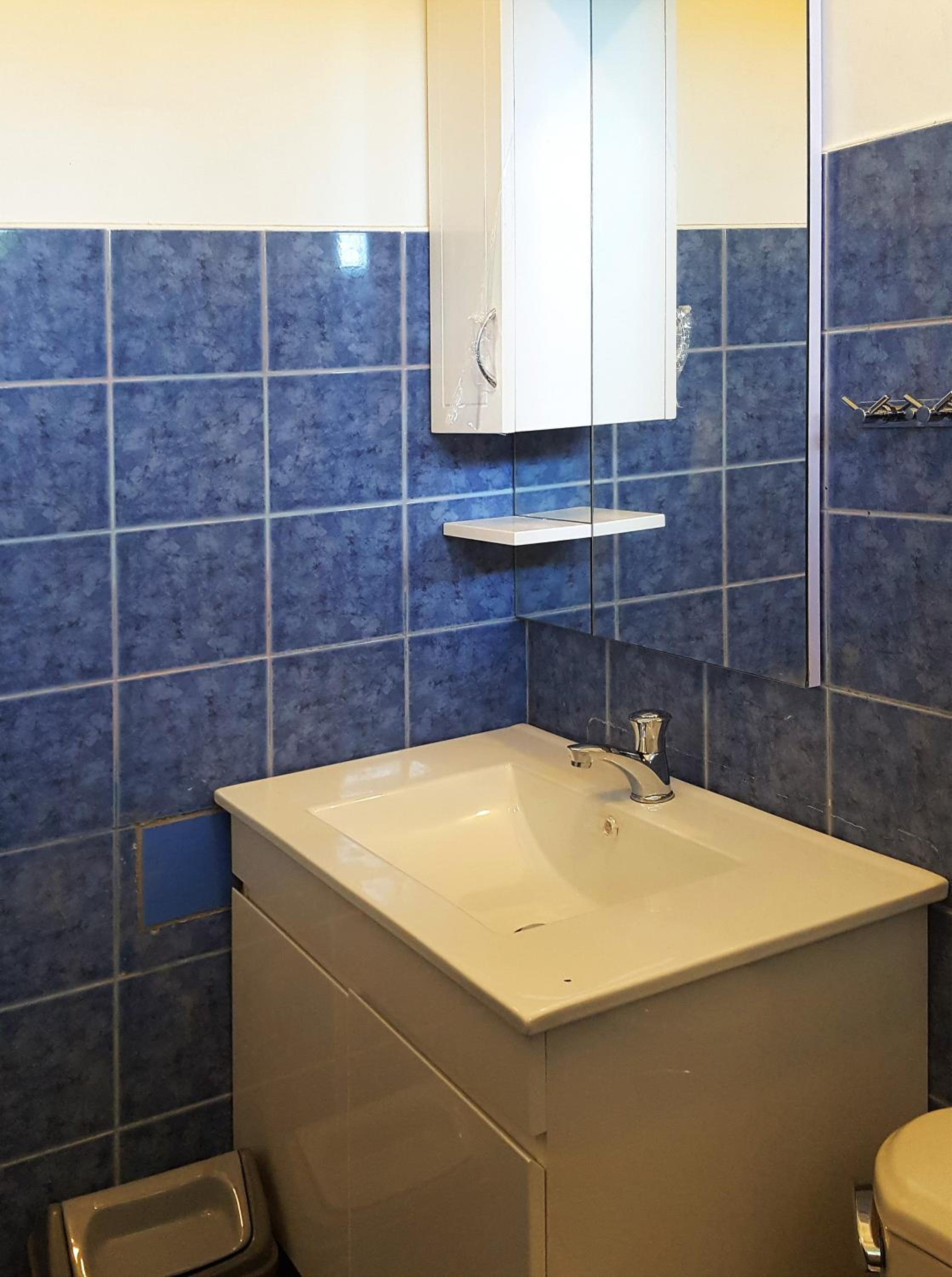 Three-Bedroom Townhouse - Photo 16