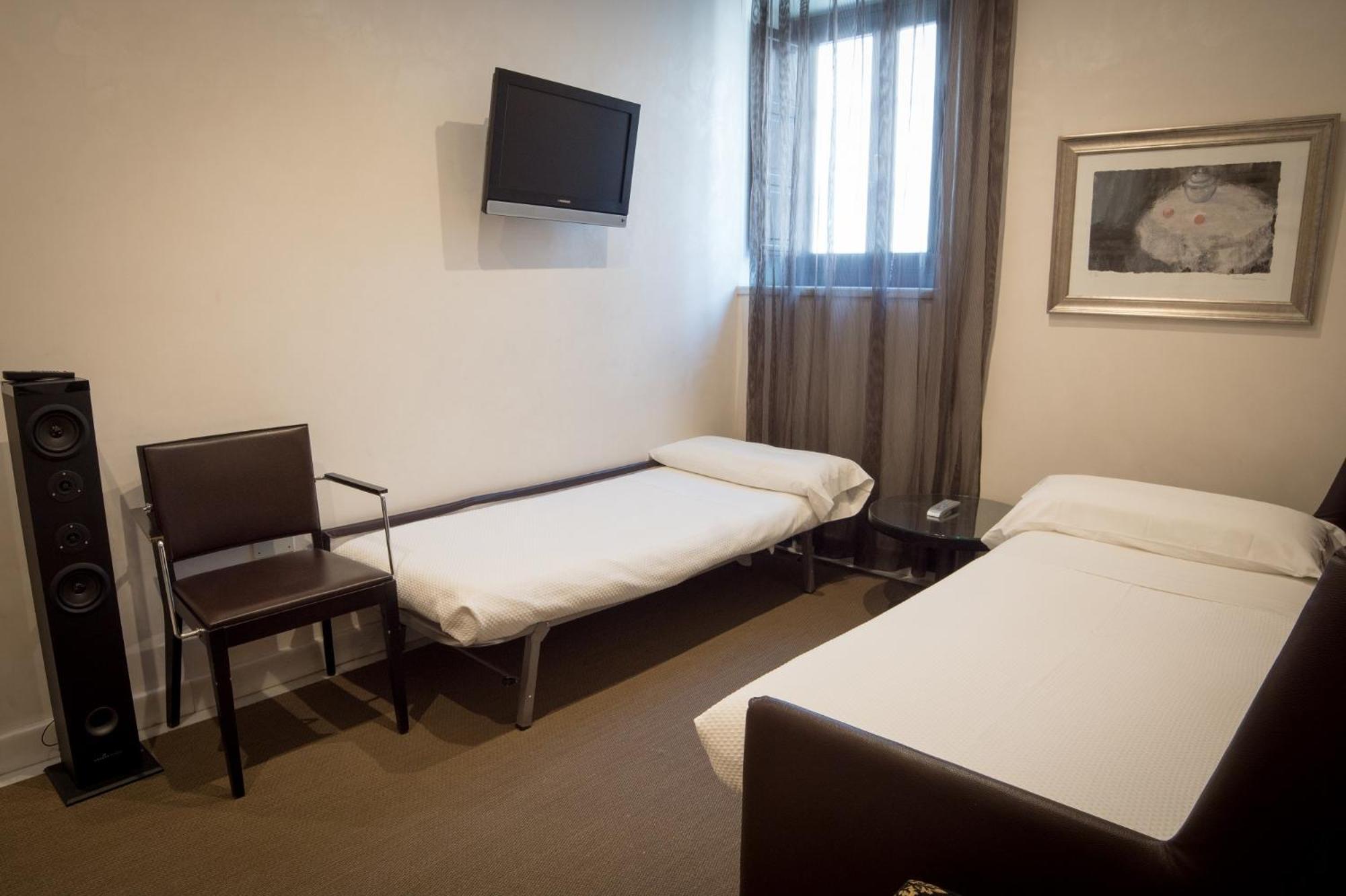 Quadruple Room - Photo 1