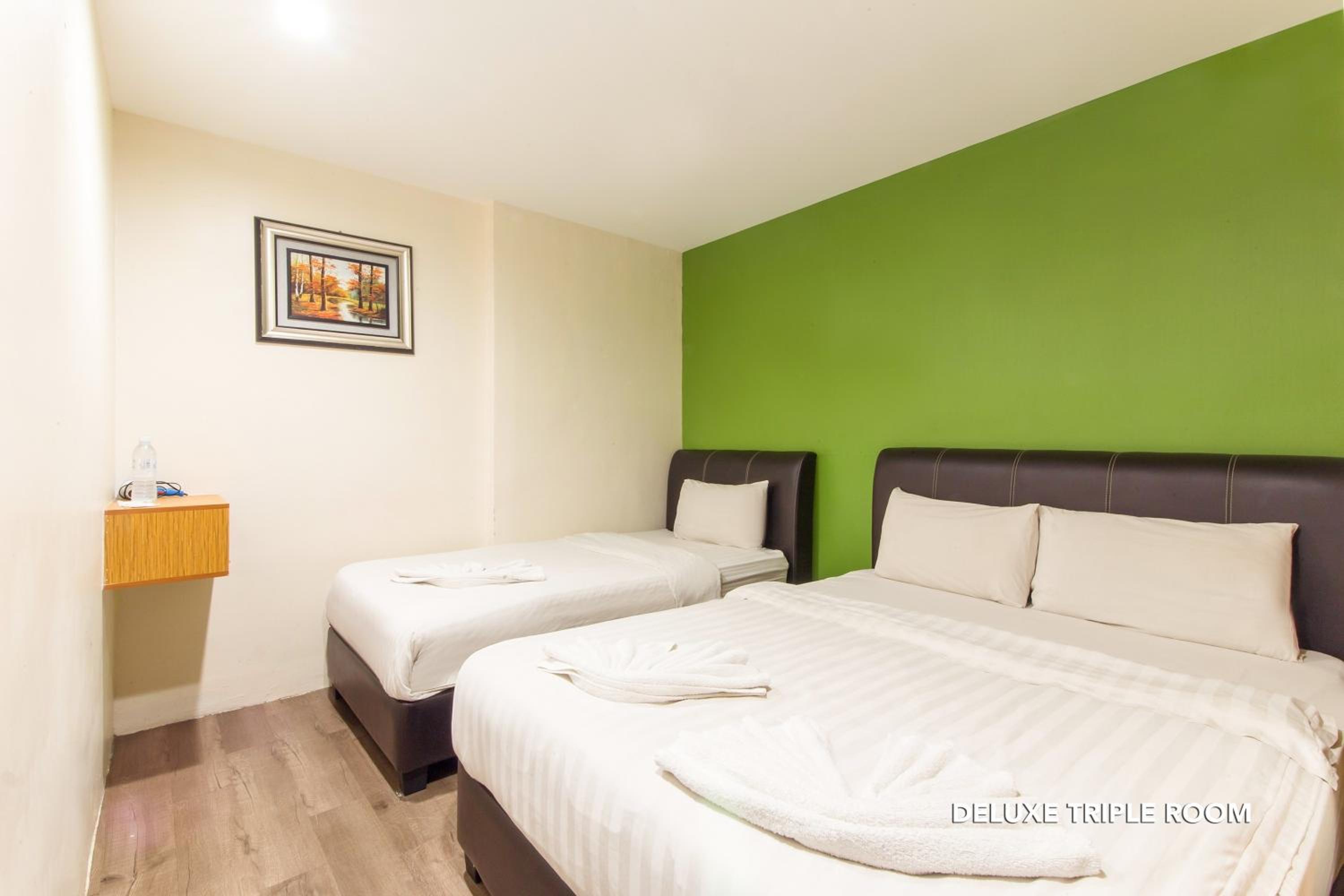 Deluxe Triple Room