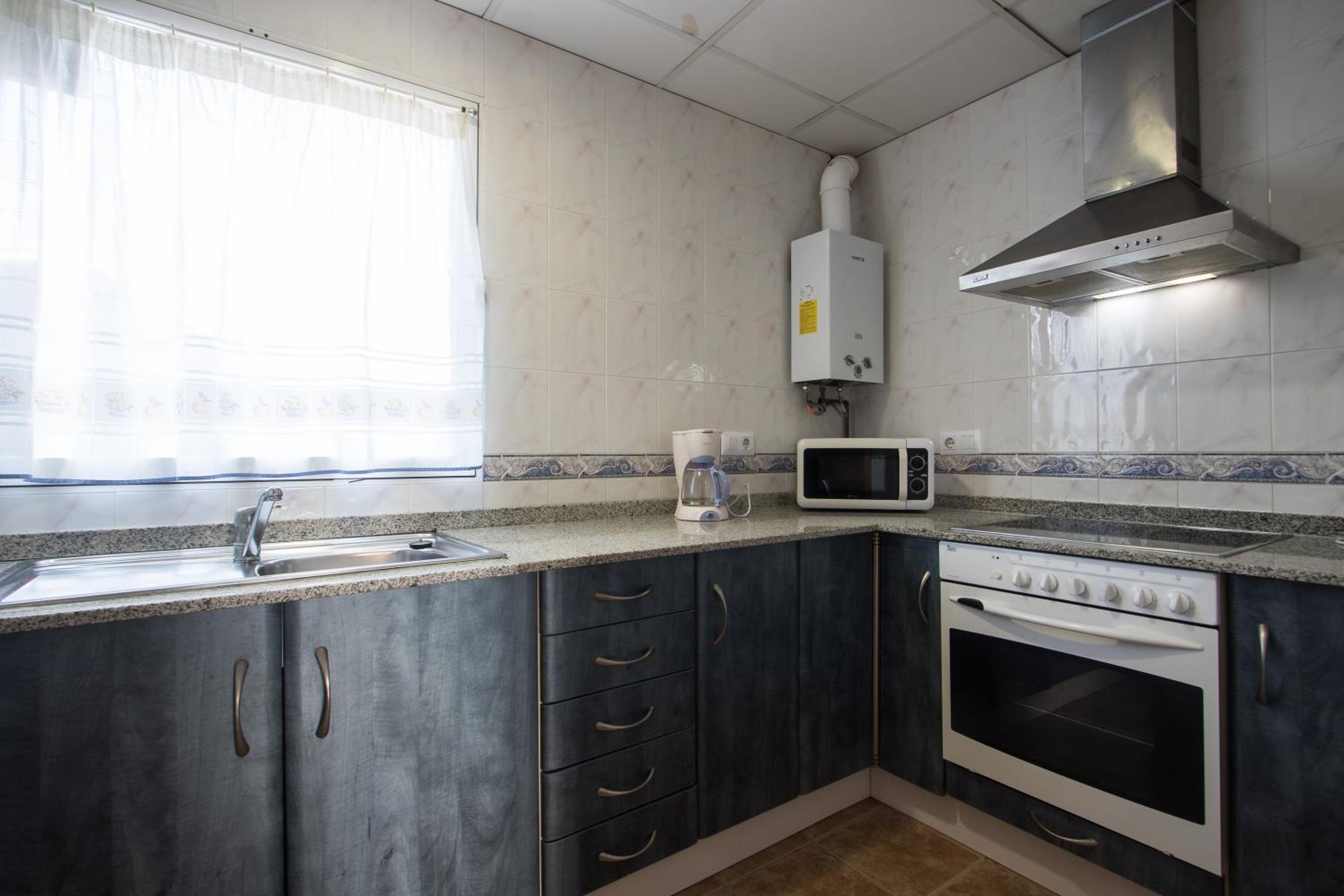 Two-Bedroom Apartment - Photo 46