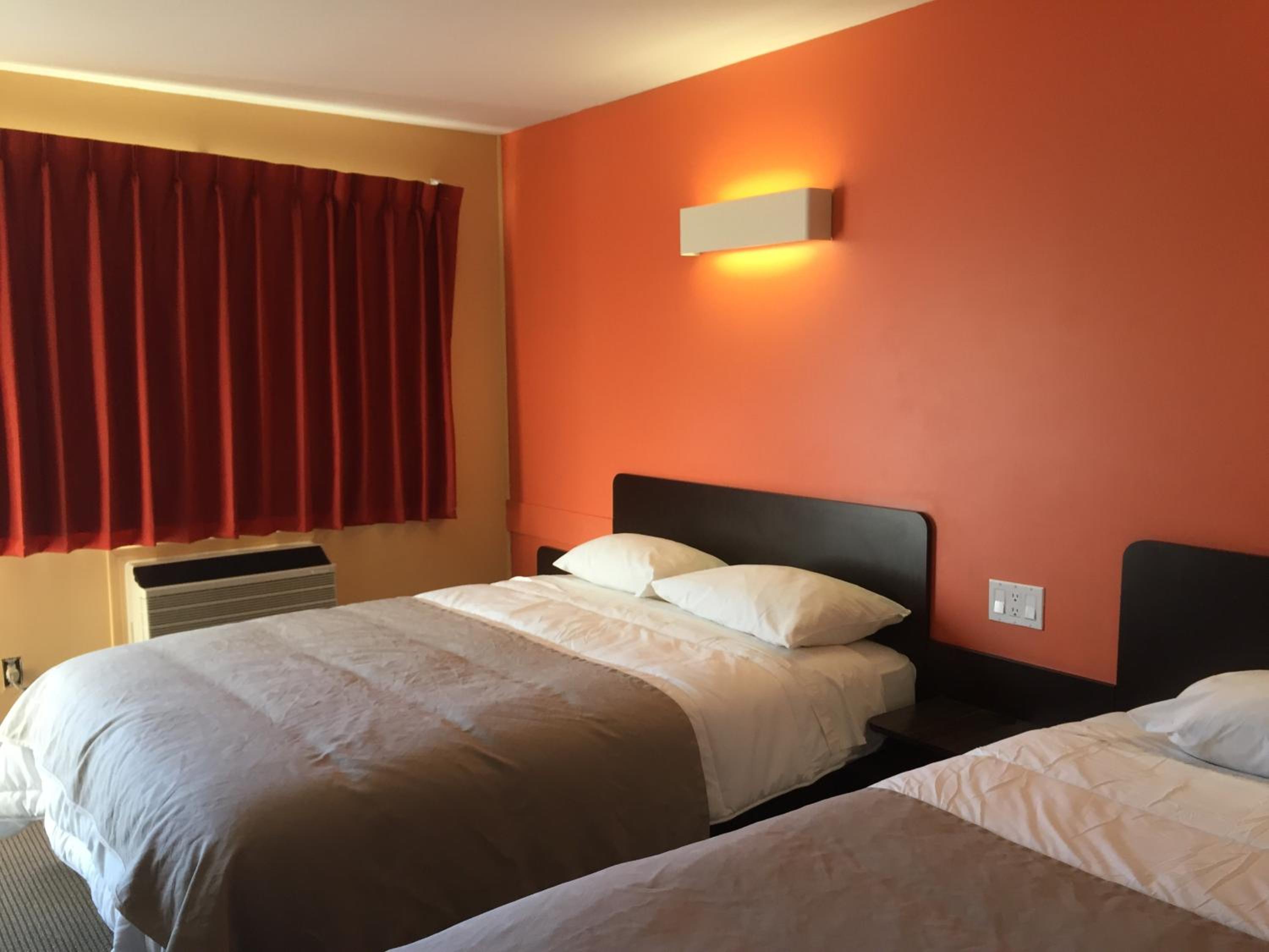 Deluxe Queen Room with Two Queen Beds - Non-Smoking photo 1