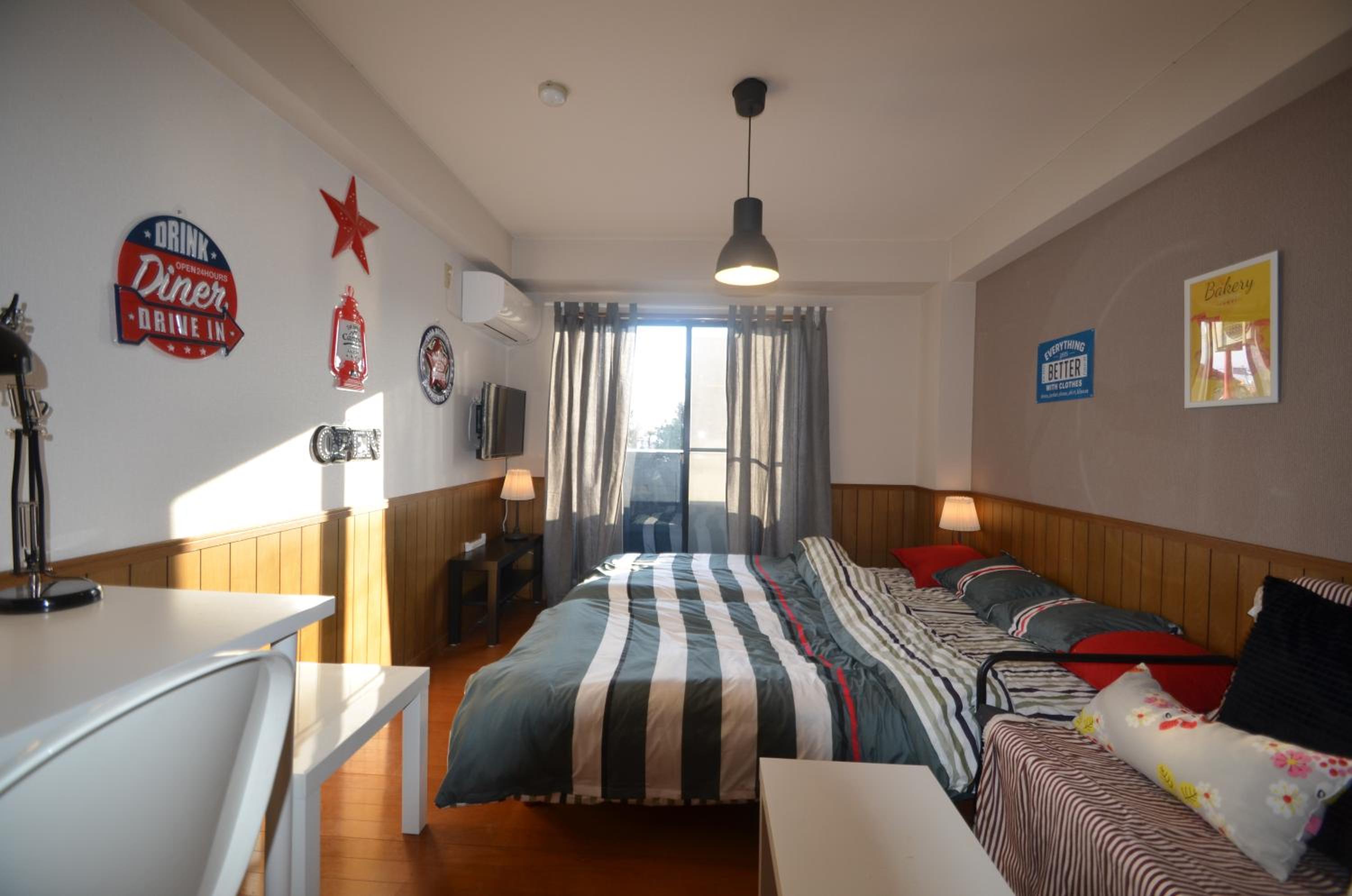 Standard Apartment (3 Adults) - Two Single Beds and One Sofa Bed