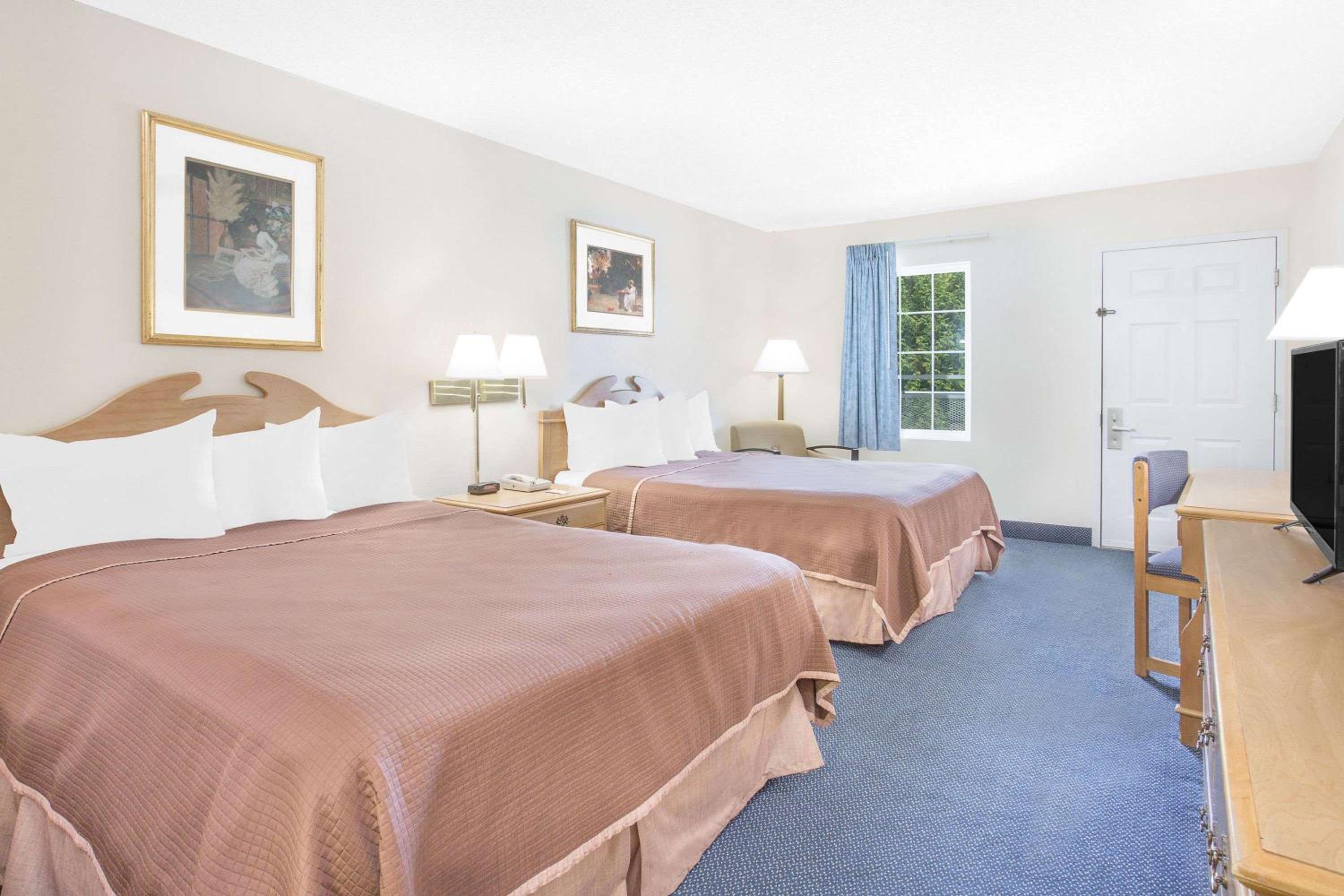 Queen Room with Two Queen Beds - Smoking - Photo 1