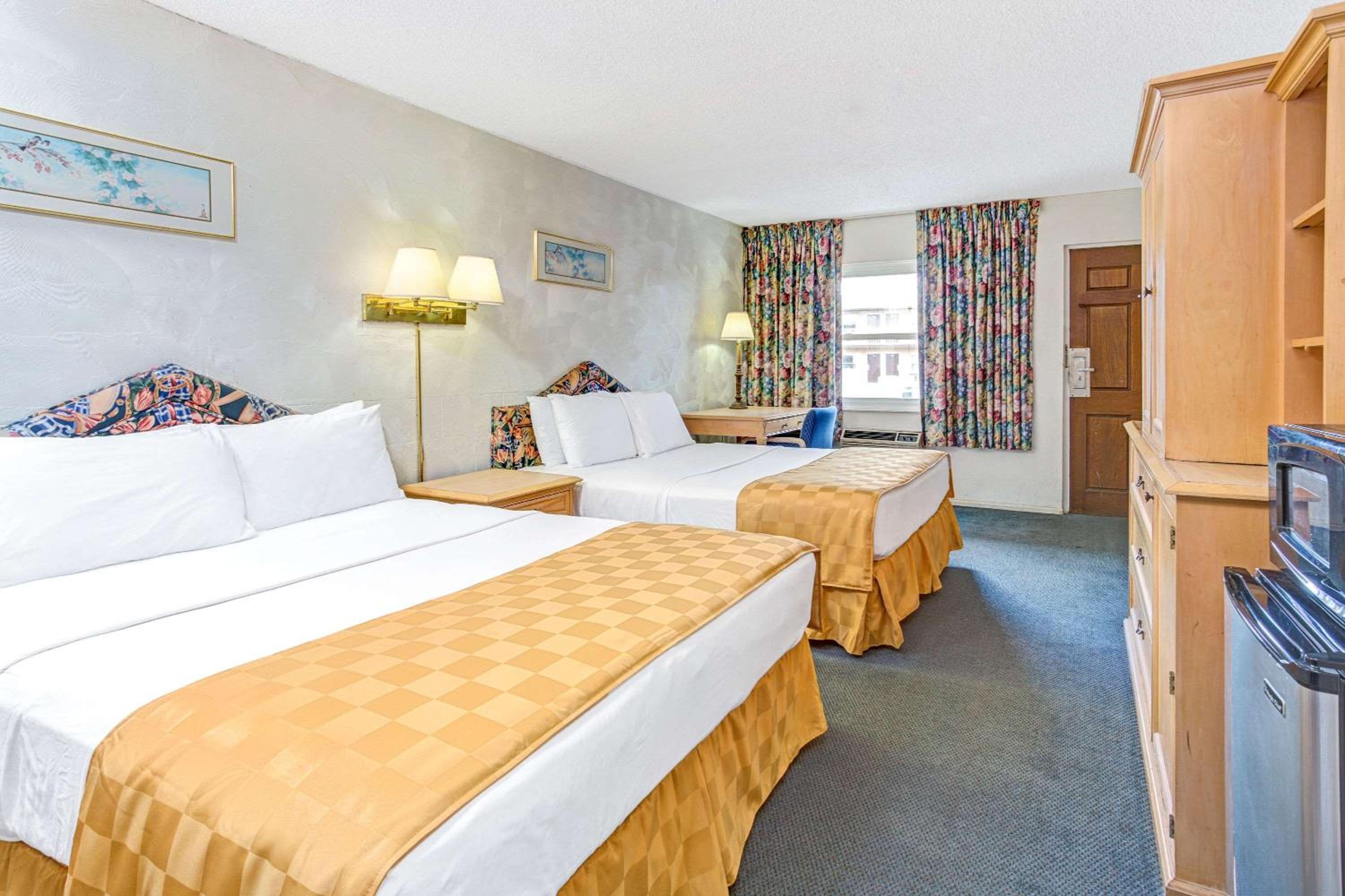 Queen Room with Two Queen Beds - Photo 1