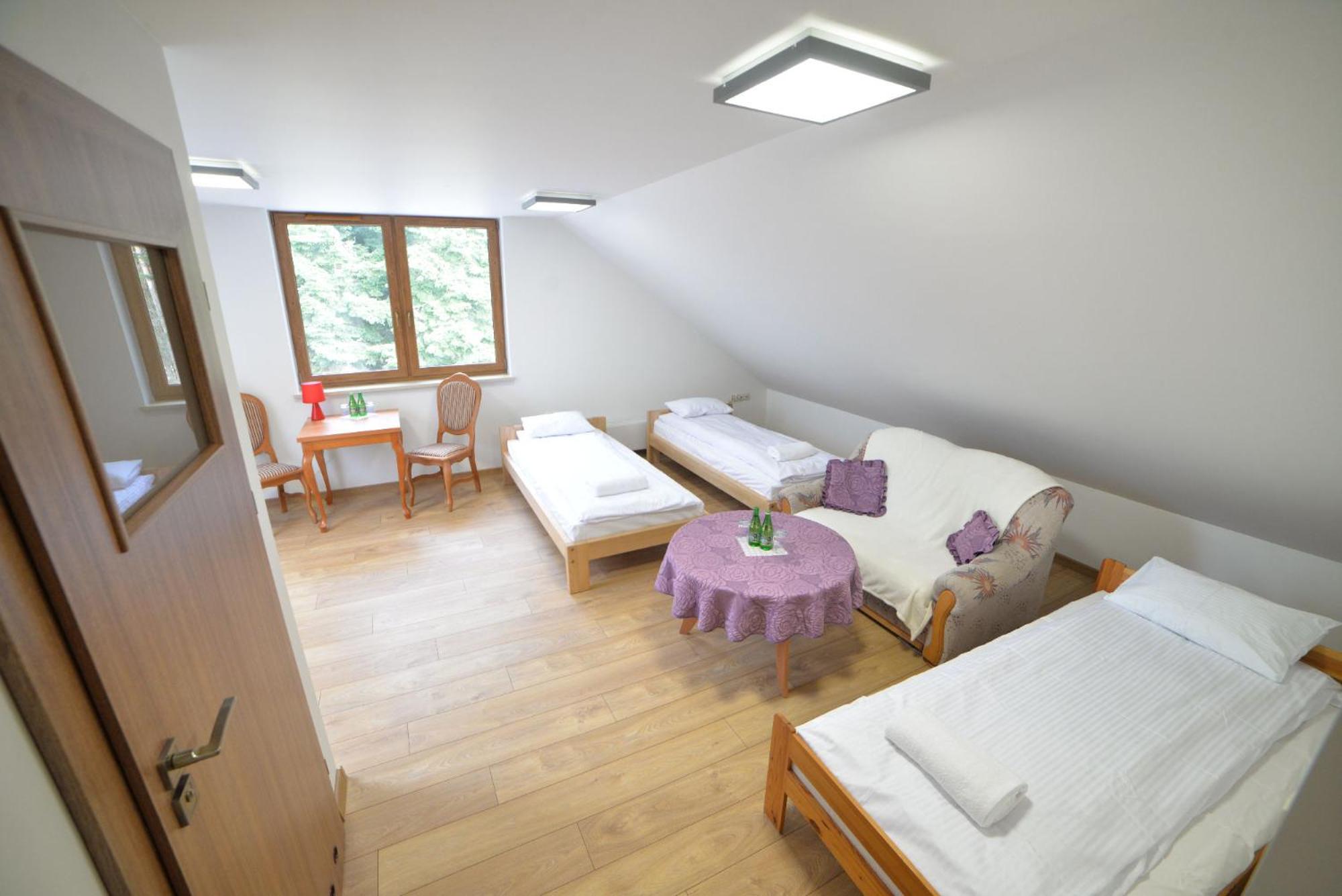 Quadruple Room with Private Bathroom