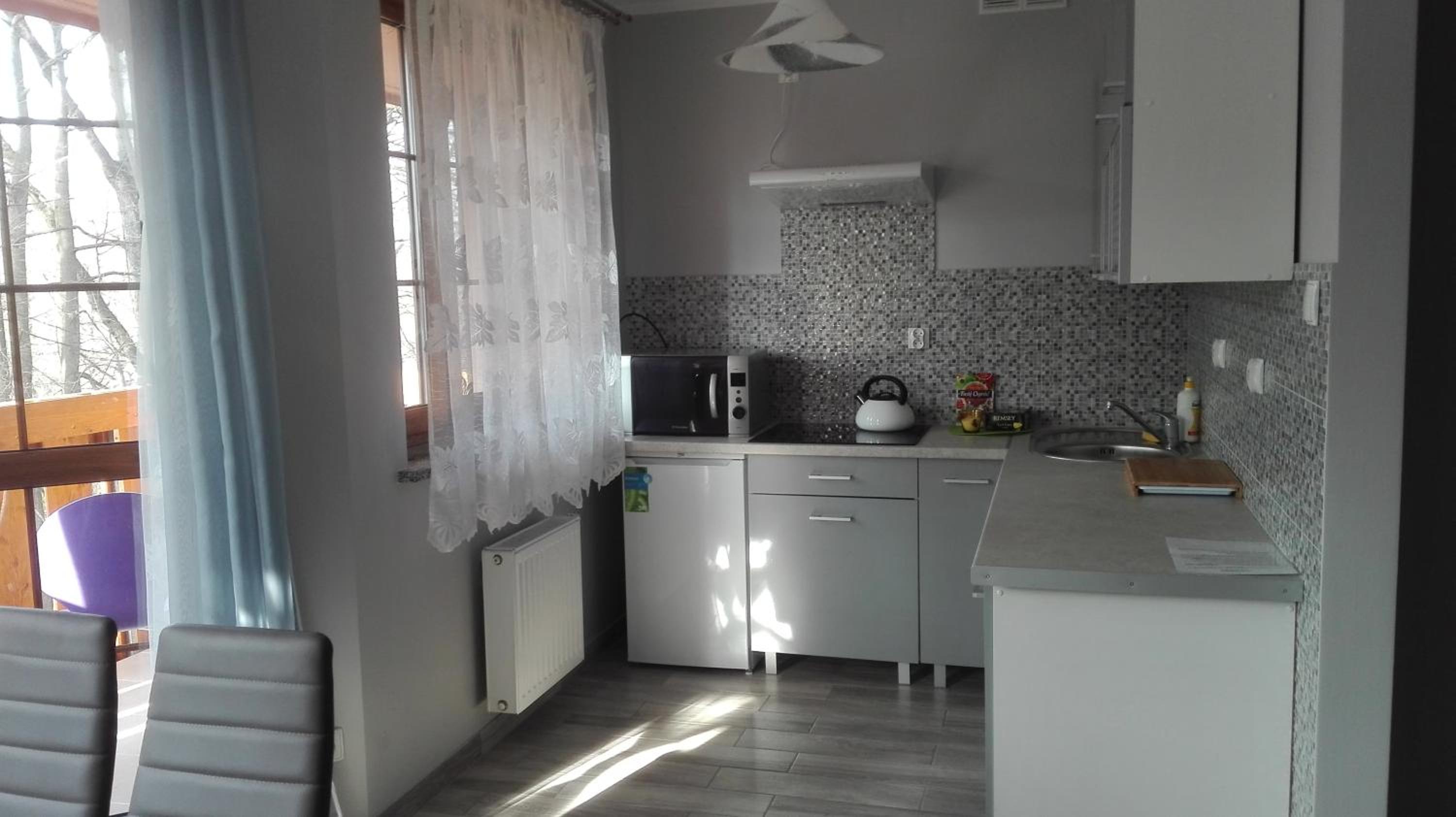 Apartment with Balcony - Photo 7