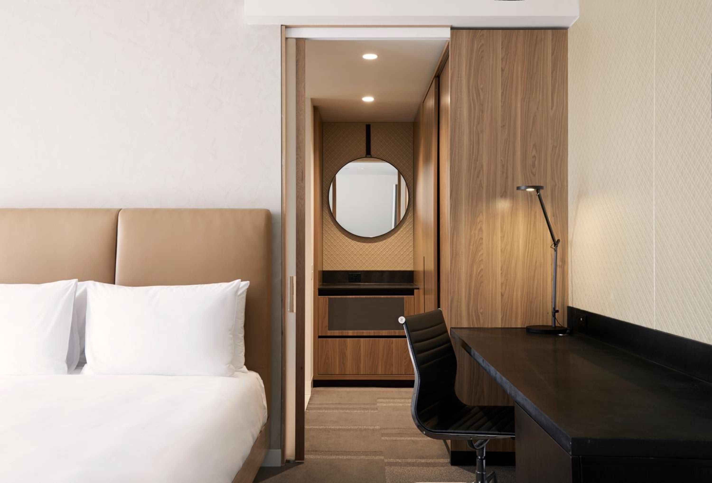Queen Room with Two Queen Beds and Sofa - High Floor