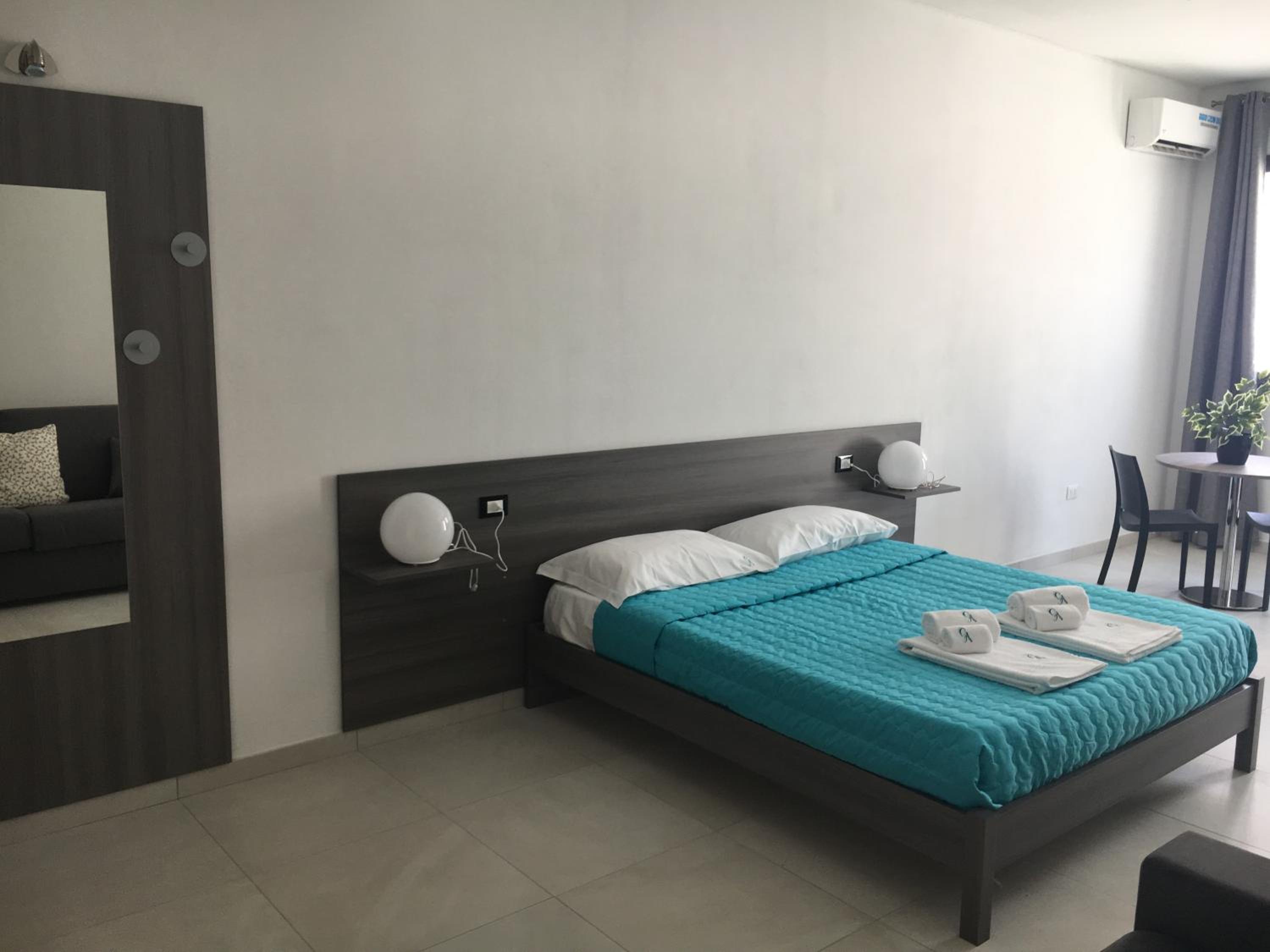 Deluxe Quadruple Room - Photo 4