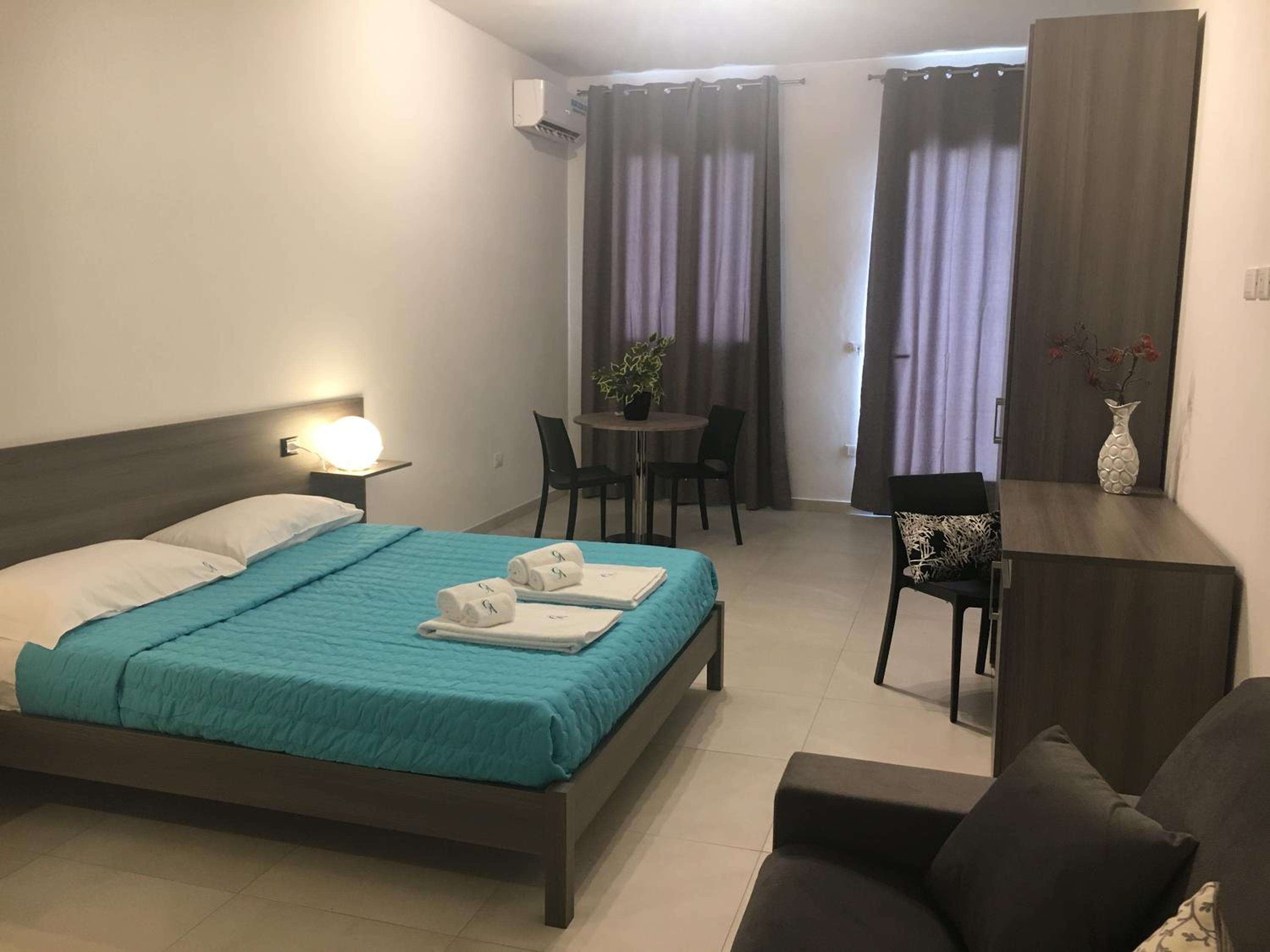 Deluxe Quadruple Room - Photo 5