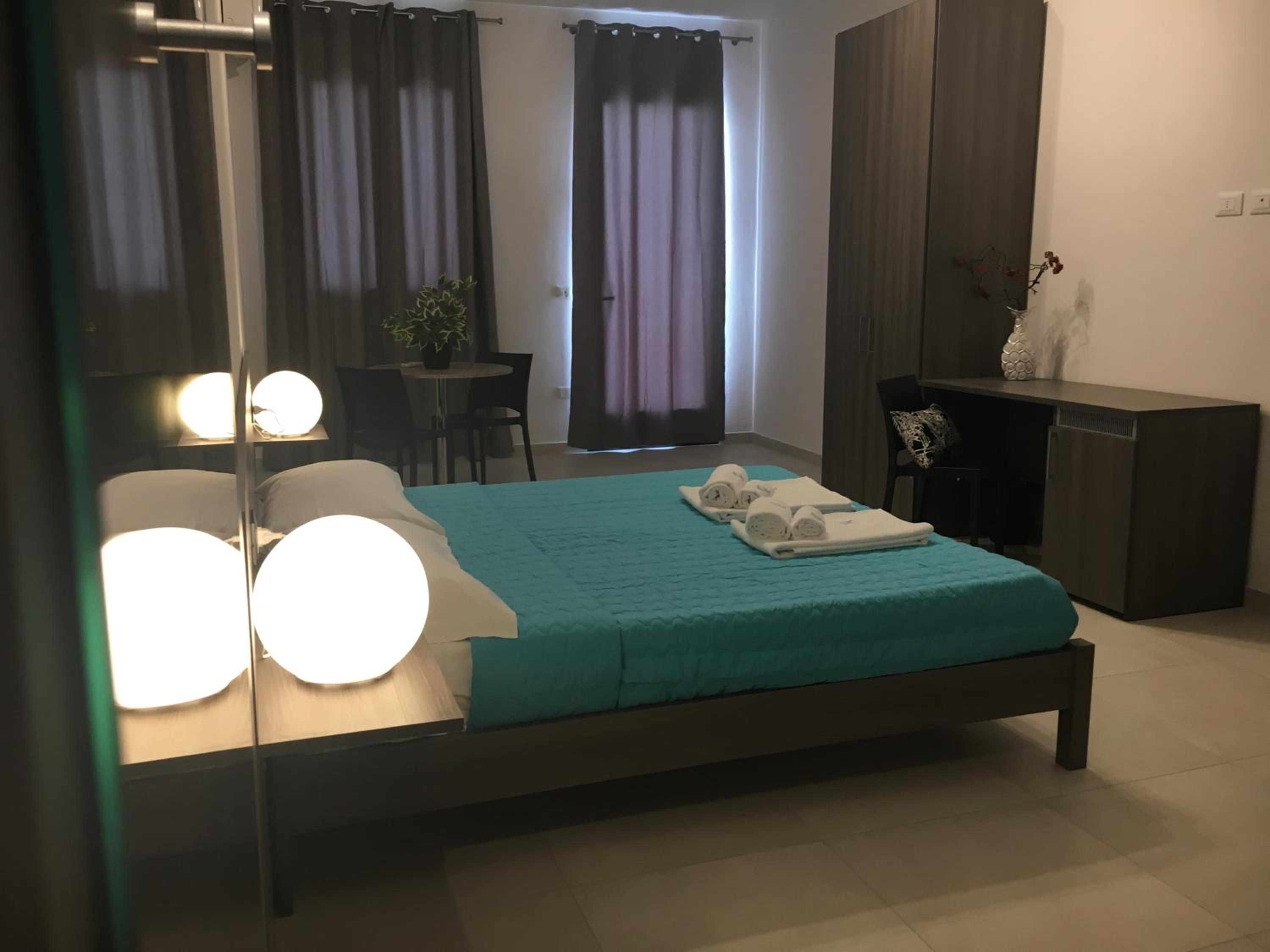 Deluxe Quadruple Room - Photo 6