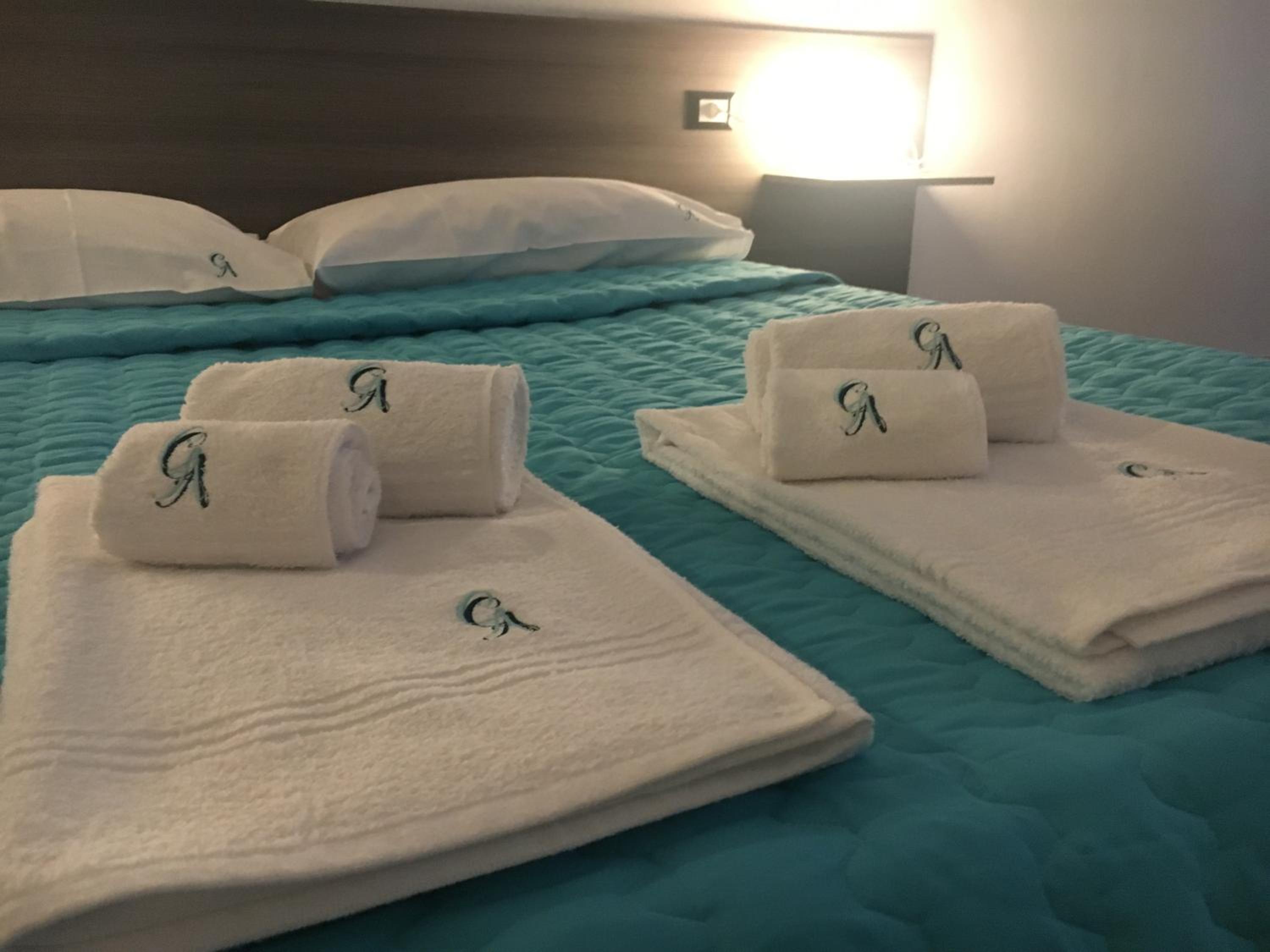 Deluxe Quadruple Room - Photo 10