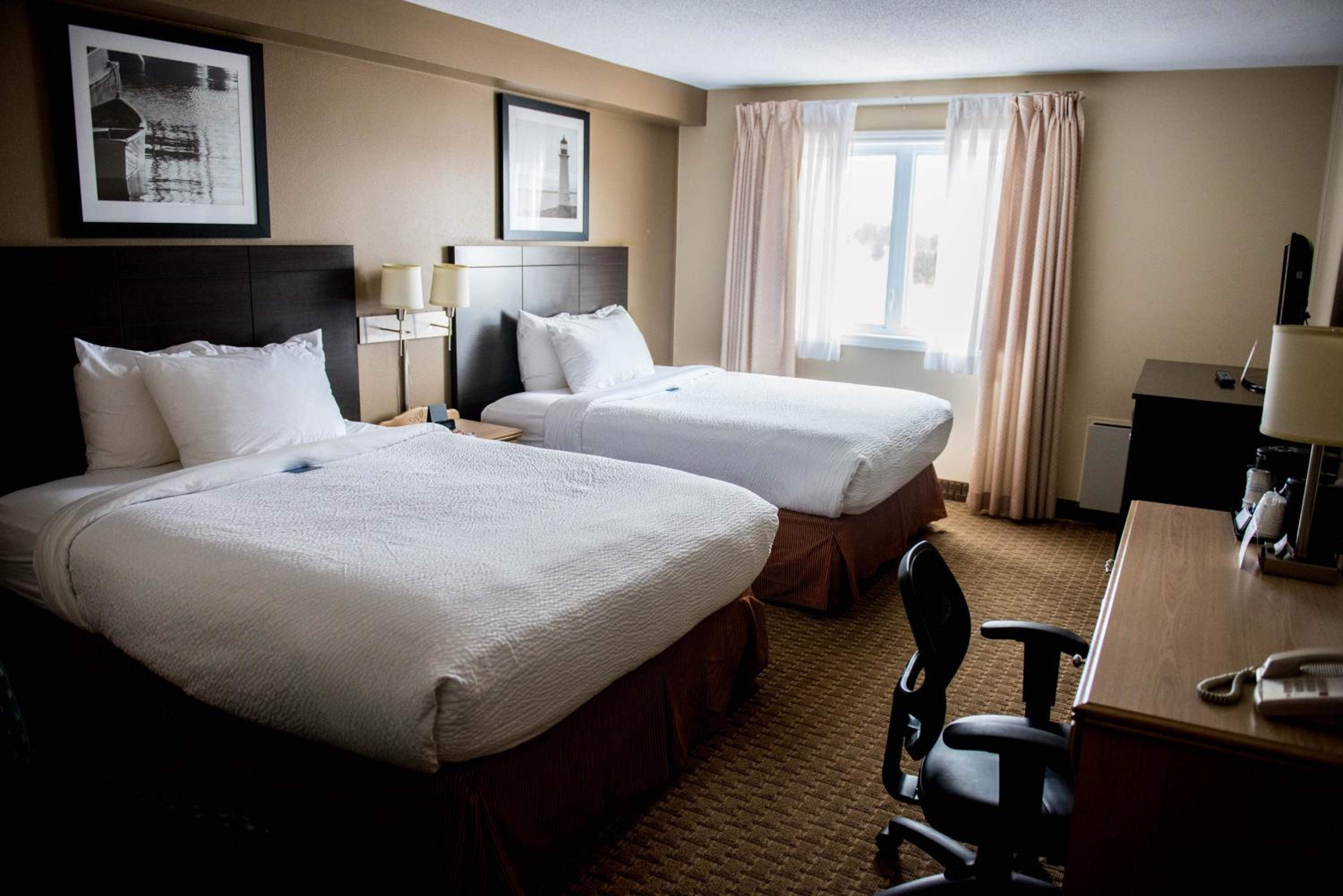 Queen Room with Two Queen Beds - Non-Smoking - Photo 1