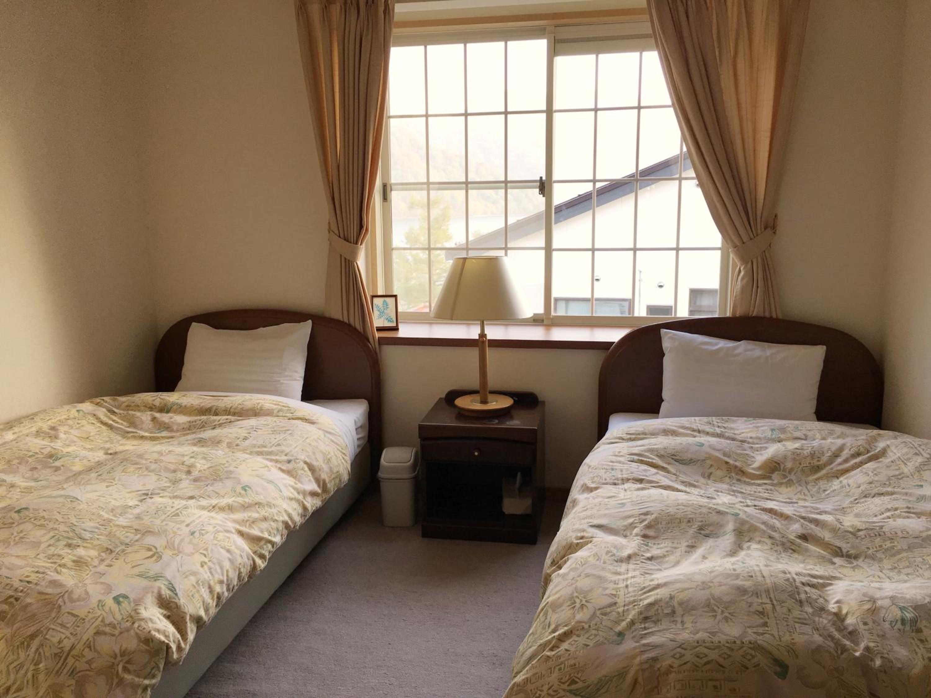 Twin Room - Photo 1