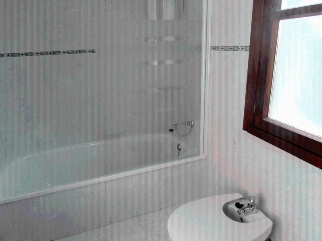 Three-Bedroom House photo 3