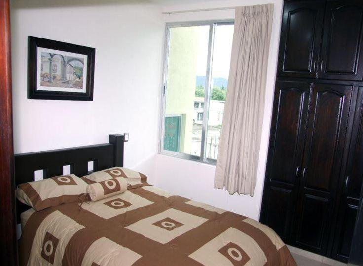Three-Bedroom Apartment - Photo 24