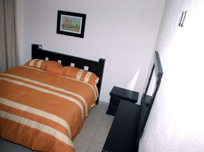 Three-Bedroom Apartment - Photo 18