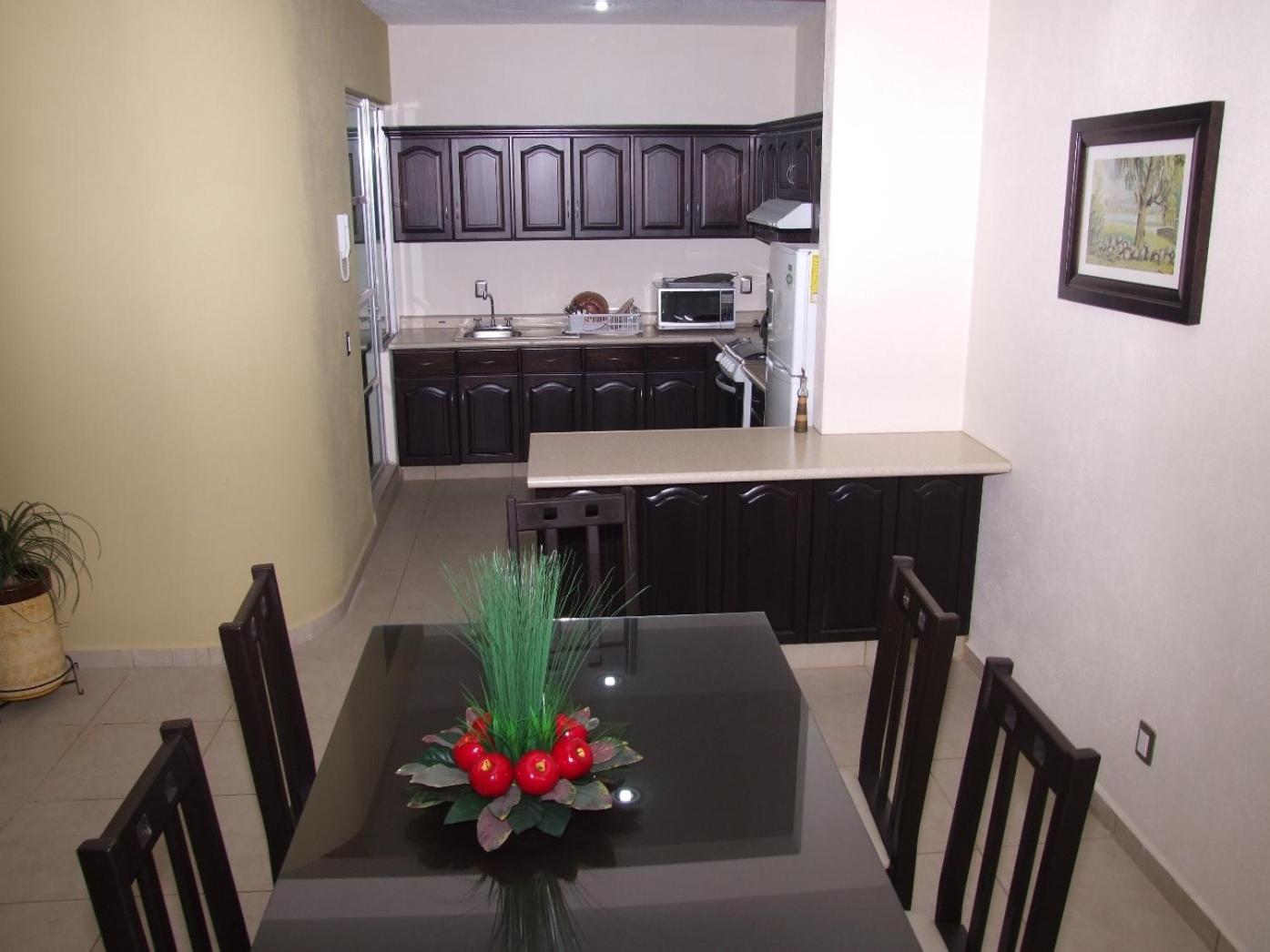 Three-Bedroom Apartment - Photo 10