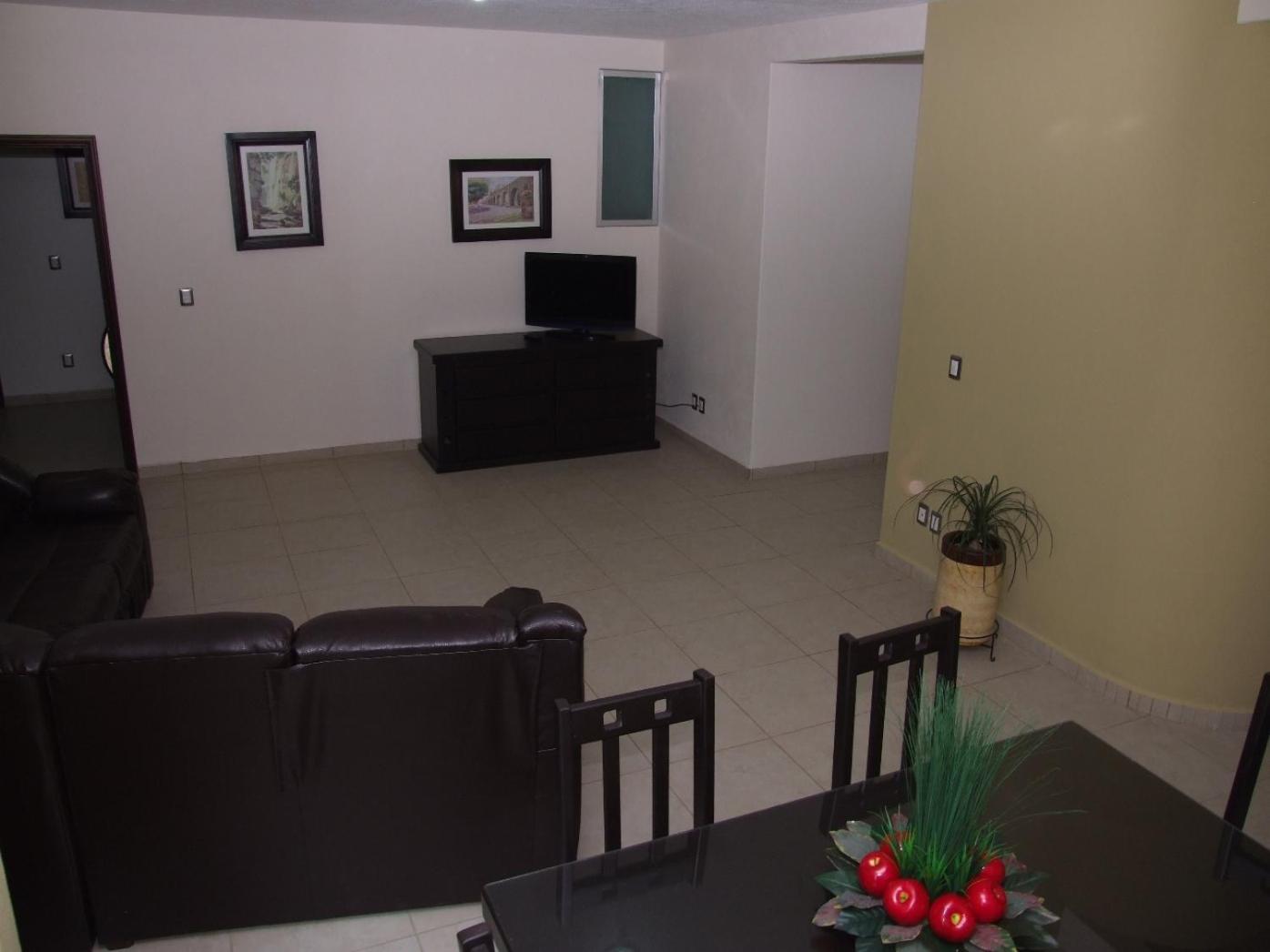 Three-Bedroom Apartment - Photo 2