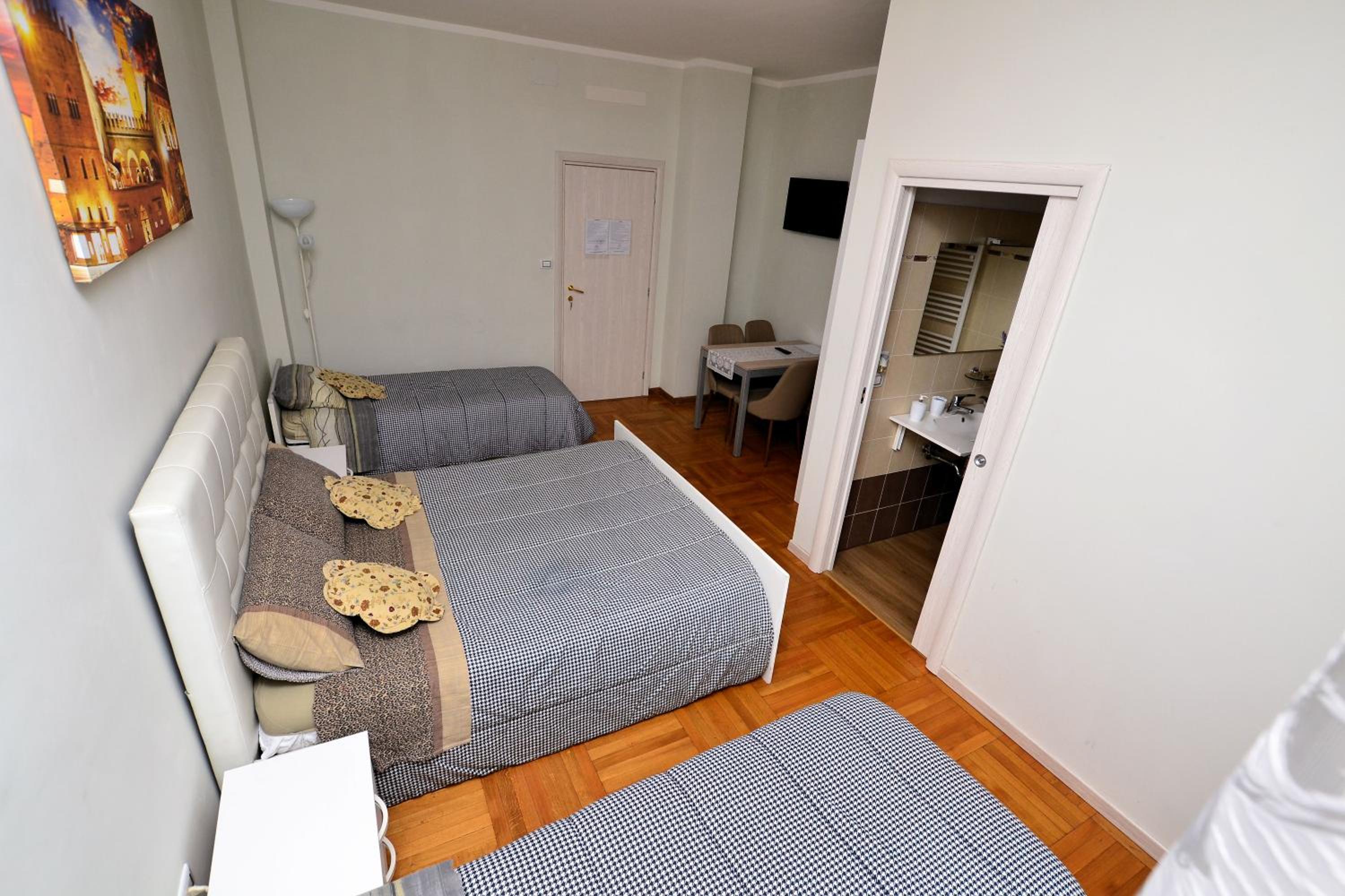 Quadruple Room with Private Bathroom