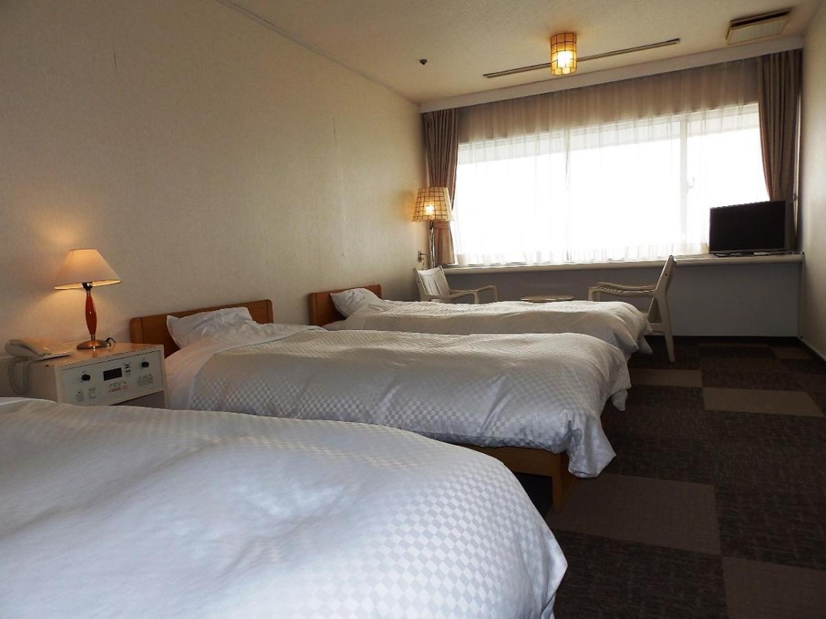 Triple Room With Sea View - Non-Smoking photo 1