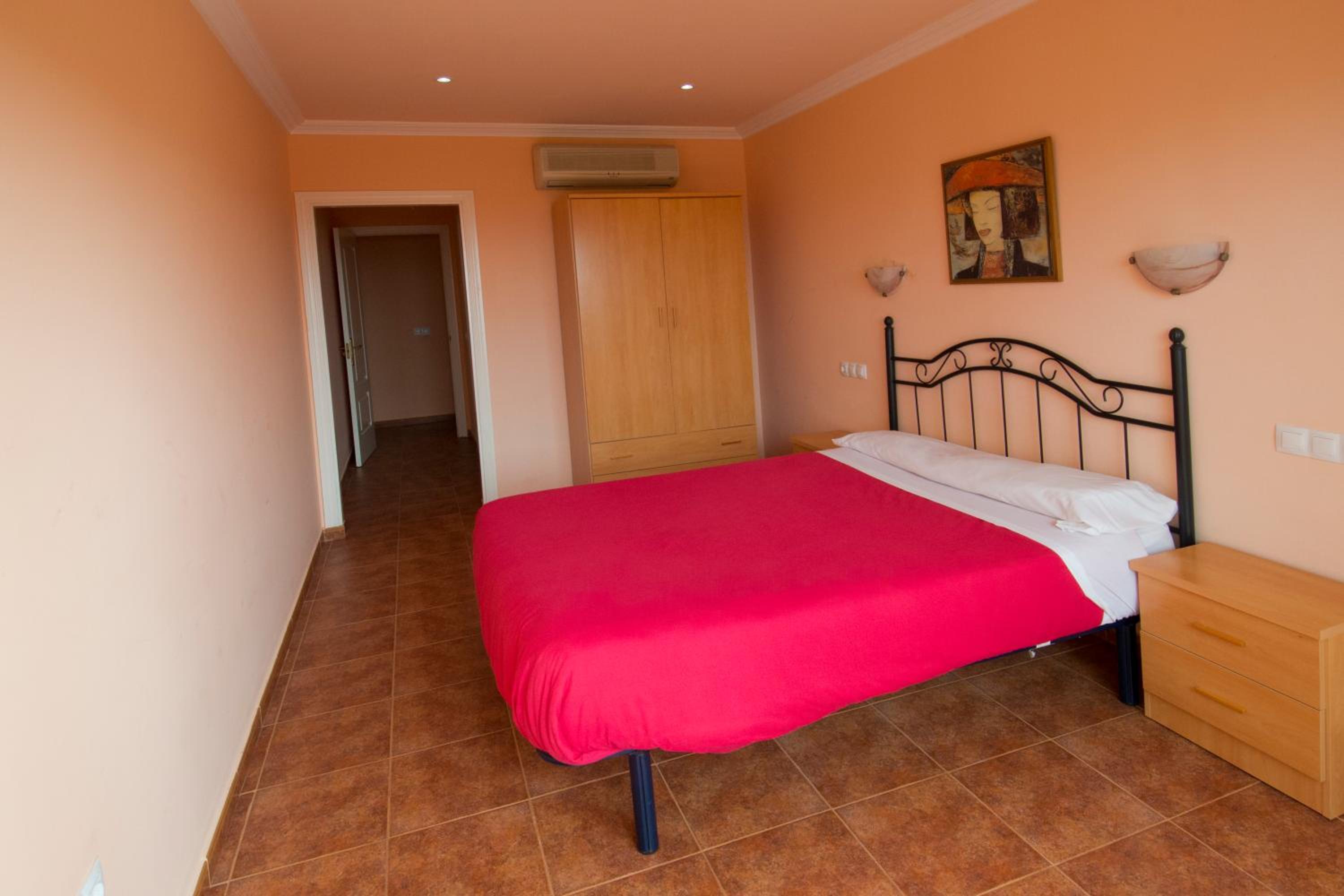 Suite de dos habitaciones con cama Queen y sofá cama