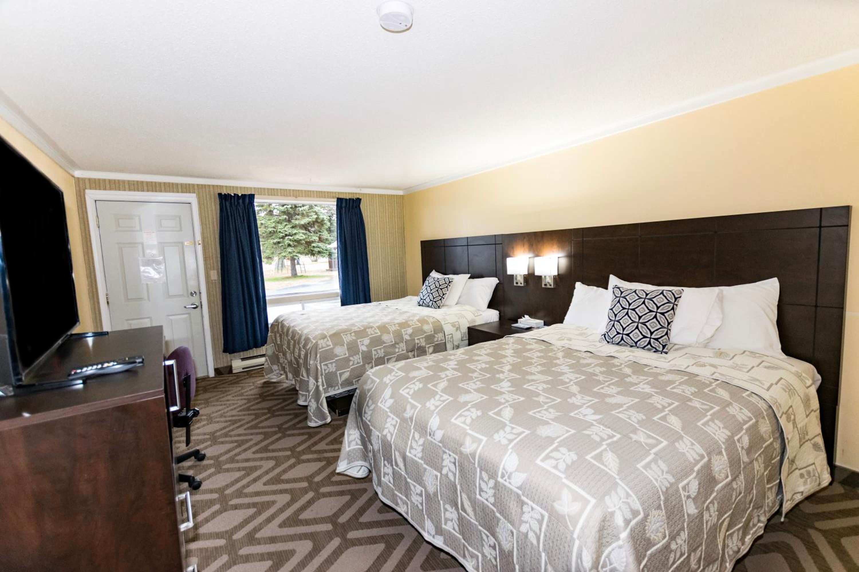 Queen Room with Two Queen Beds - Photo 1
