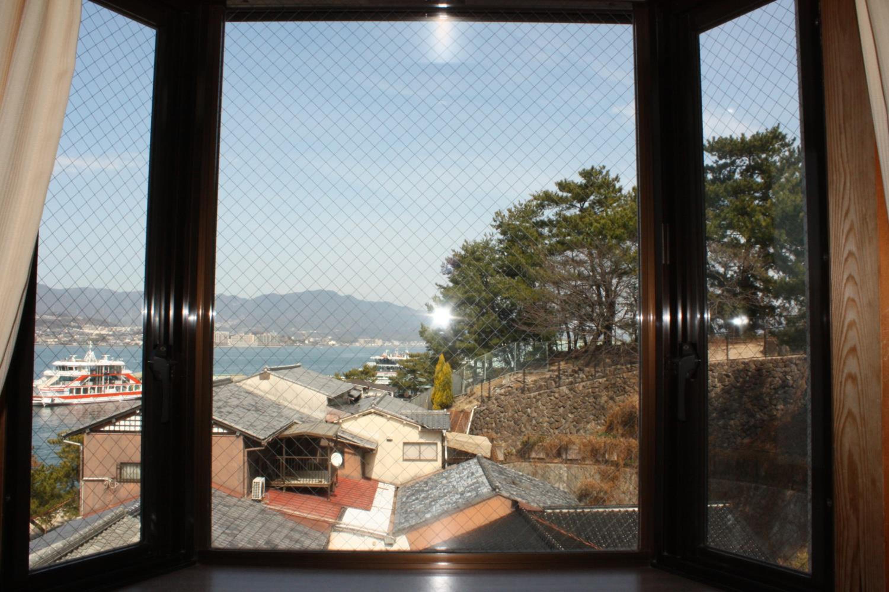 Quadruple Japanese-Style Room with Mountain View and Shared Bathroom photo 3