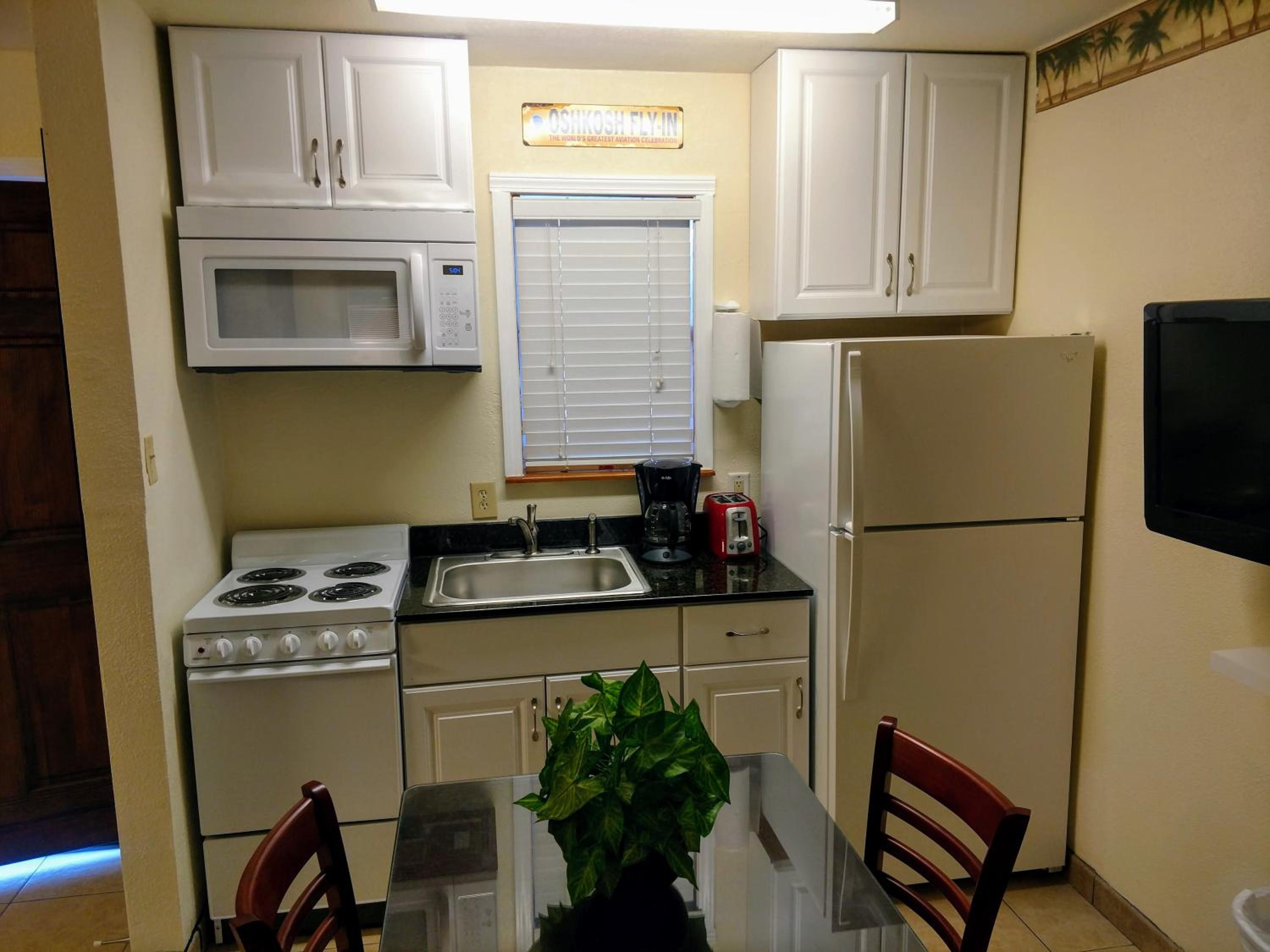 Queen Room with Two Queen Beds with Kitchen - Photo 2
