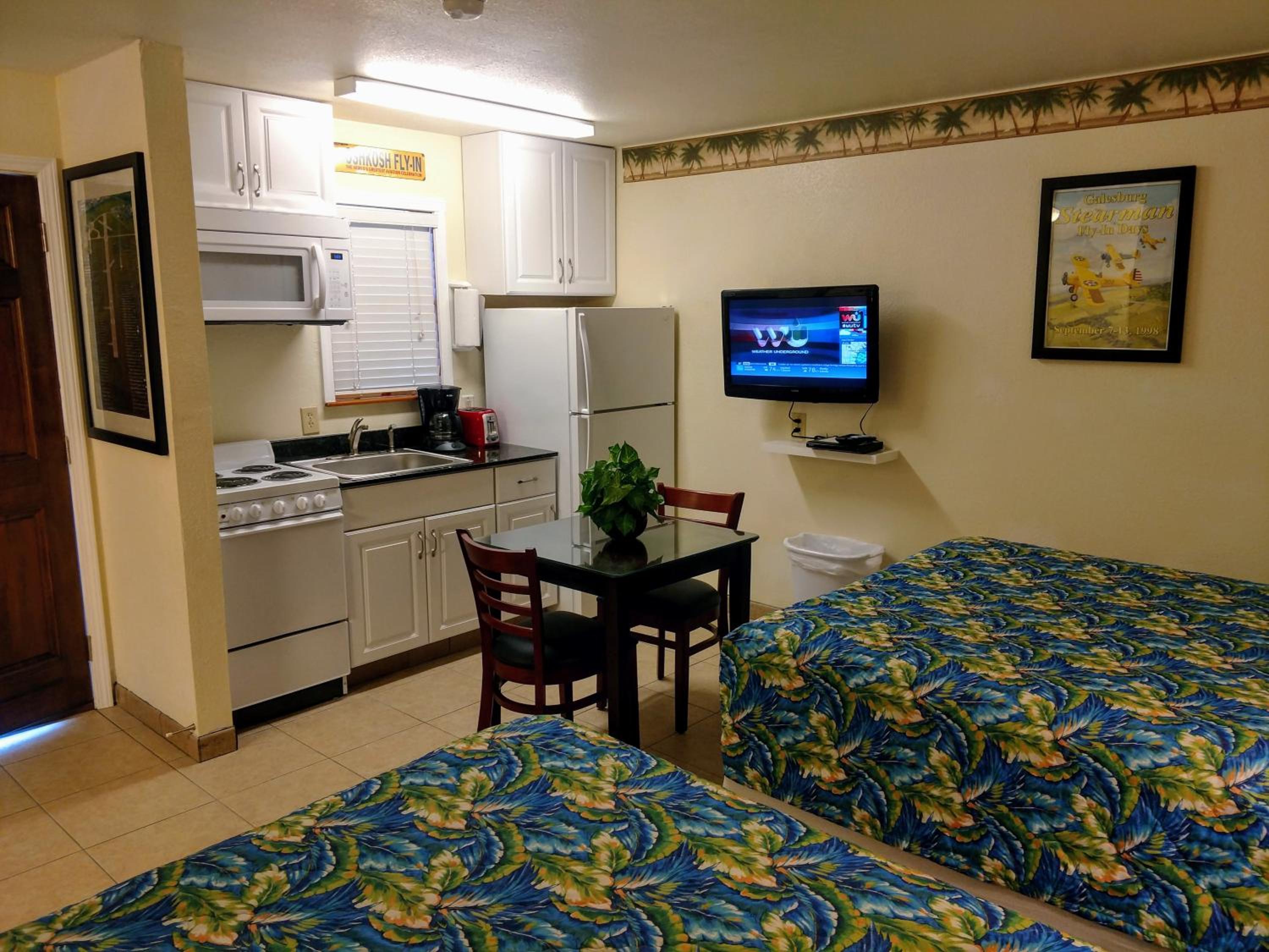 Queen Room with Two Queen Beds with Kitchen - Photo 1