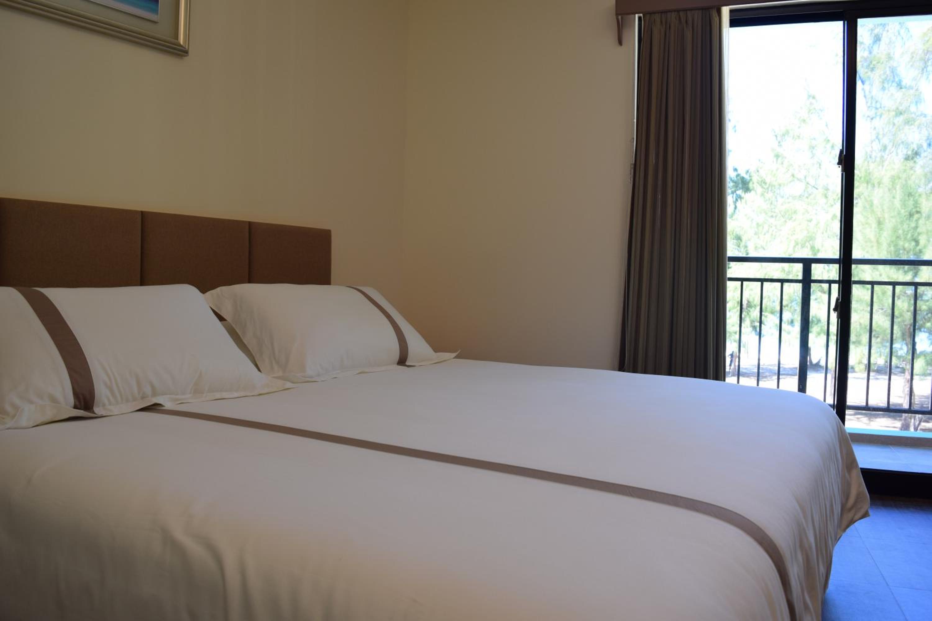 Deluxe Double Room (2 Adults + 1 Child) photo 2