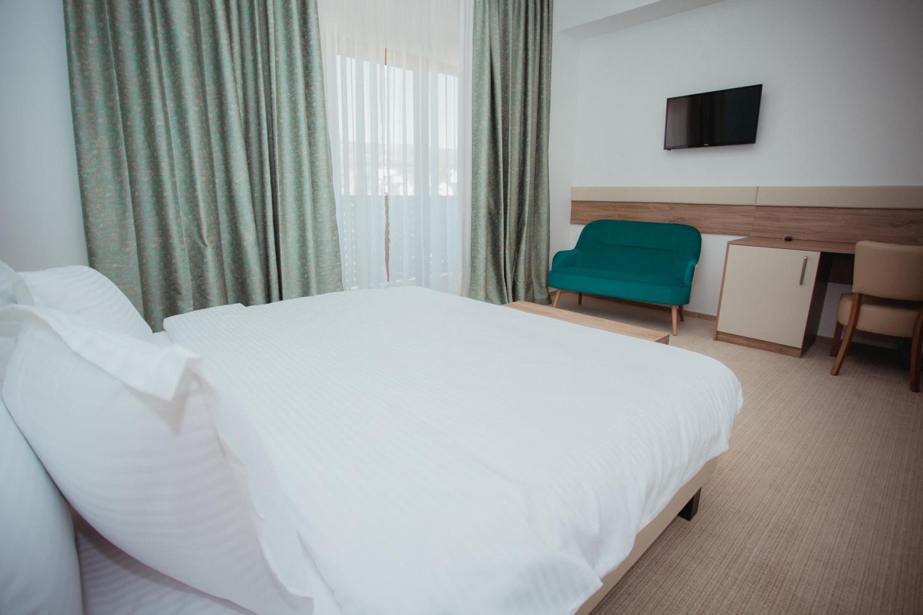 Deluxe Room - Photo 1