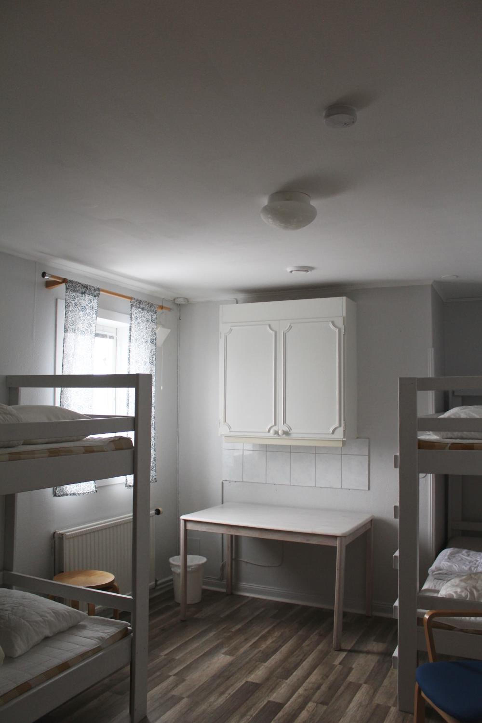 Comfort Quadruple Room (Private Toilet - Shared Shower) photo 1