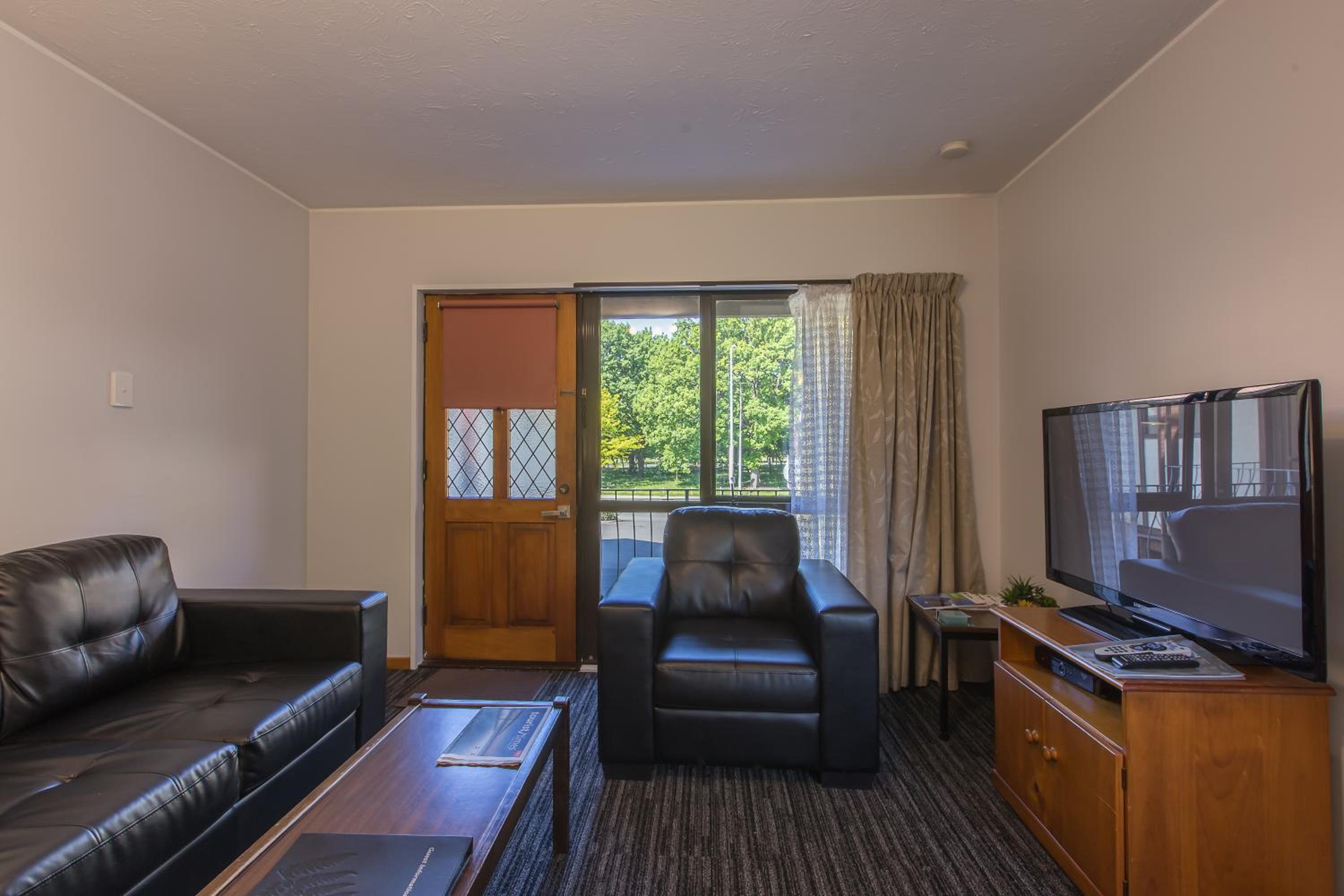 One-Bedroom Apartment with King and Single bed - Photo 2