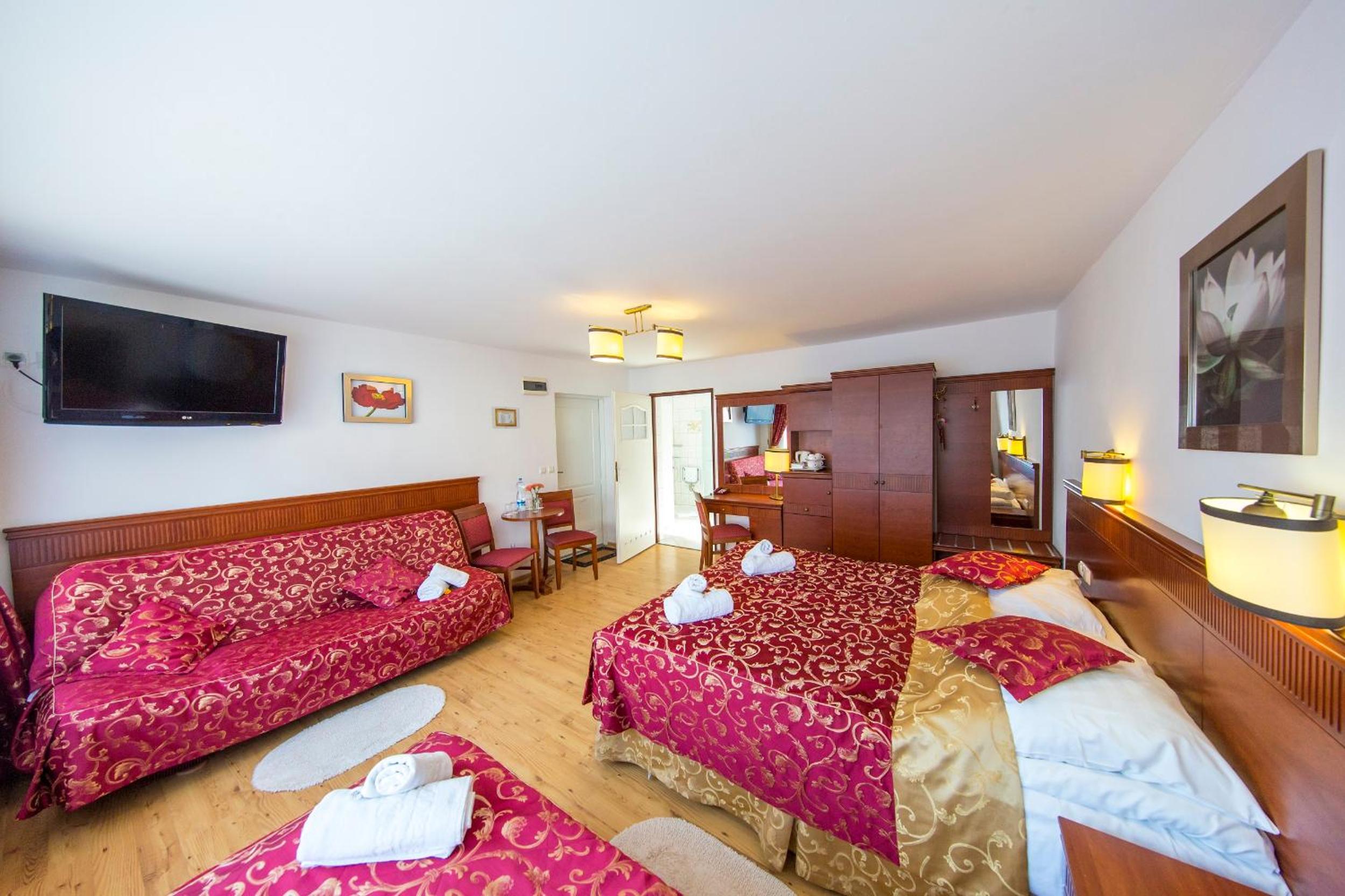 3 person family bungalow with double bed single bed and sofa