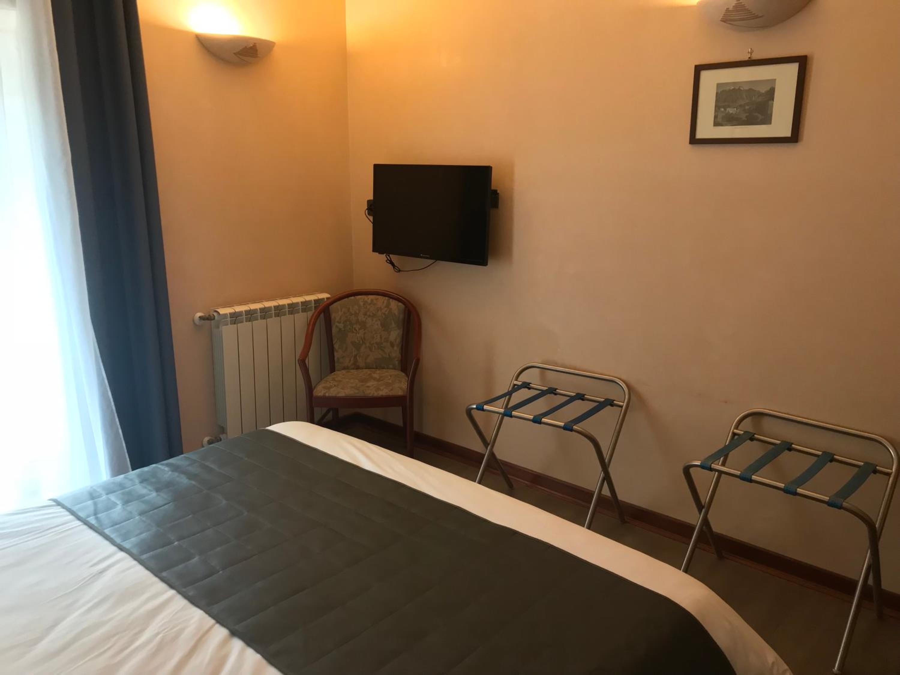 Quadruple Room with Balcony photo 3