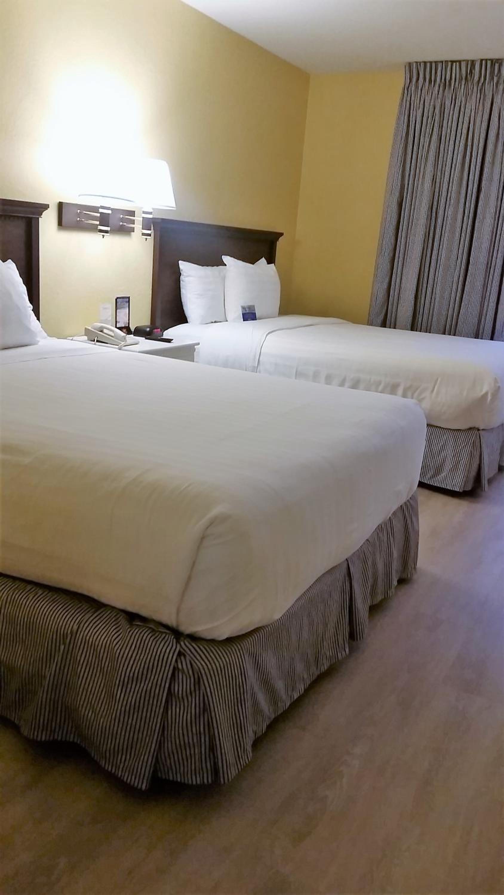 Queen Room with Two Queen Beds - Photo 1