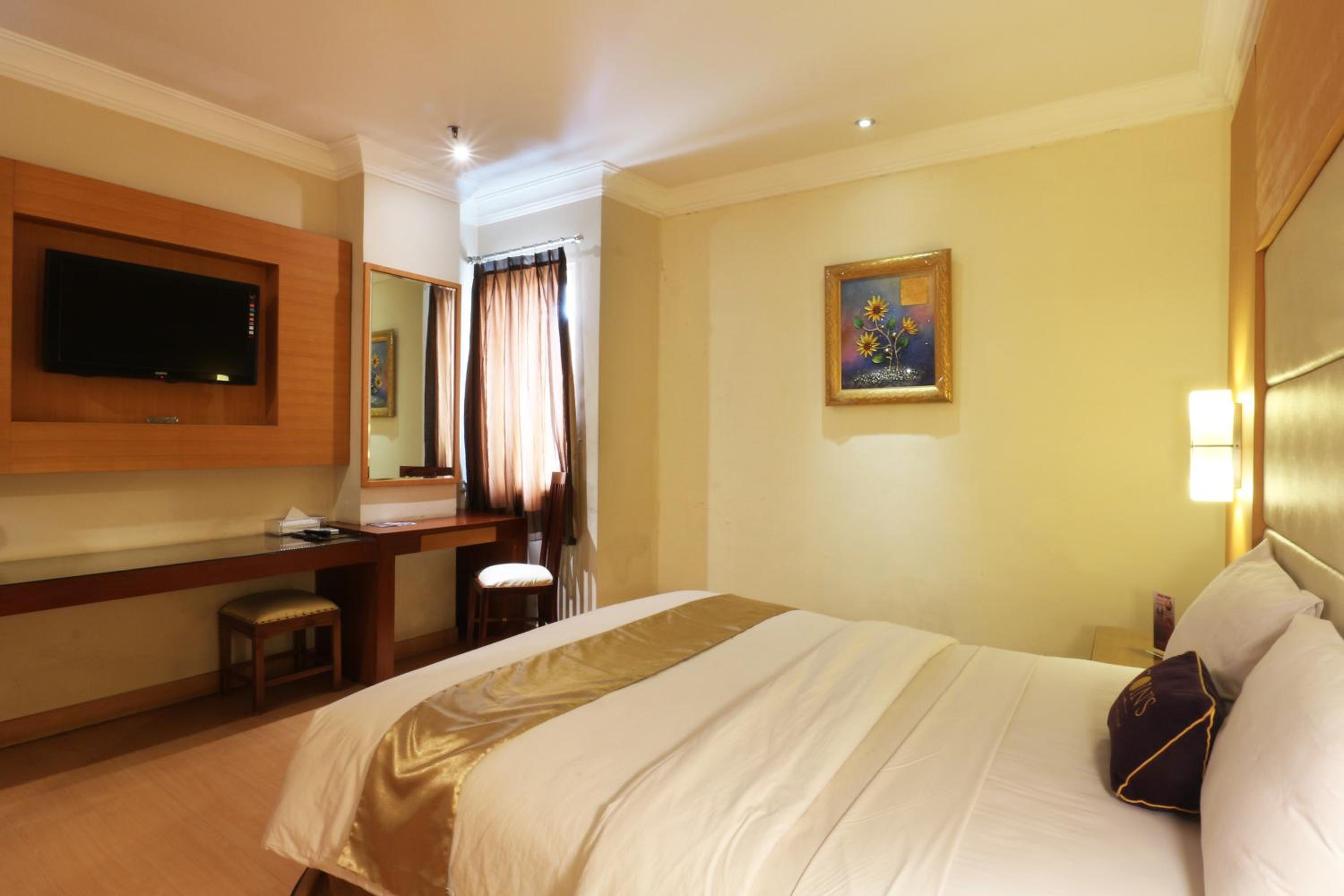 Deluxe Room - Photo 14