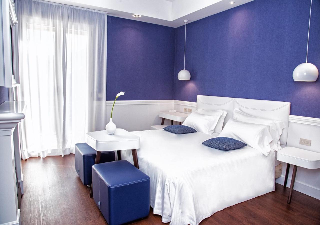 Deluxe Triple Room with Balcony - Photo 1
