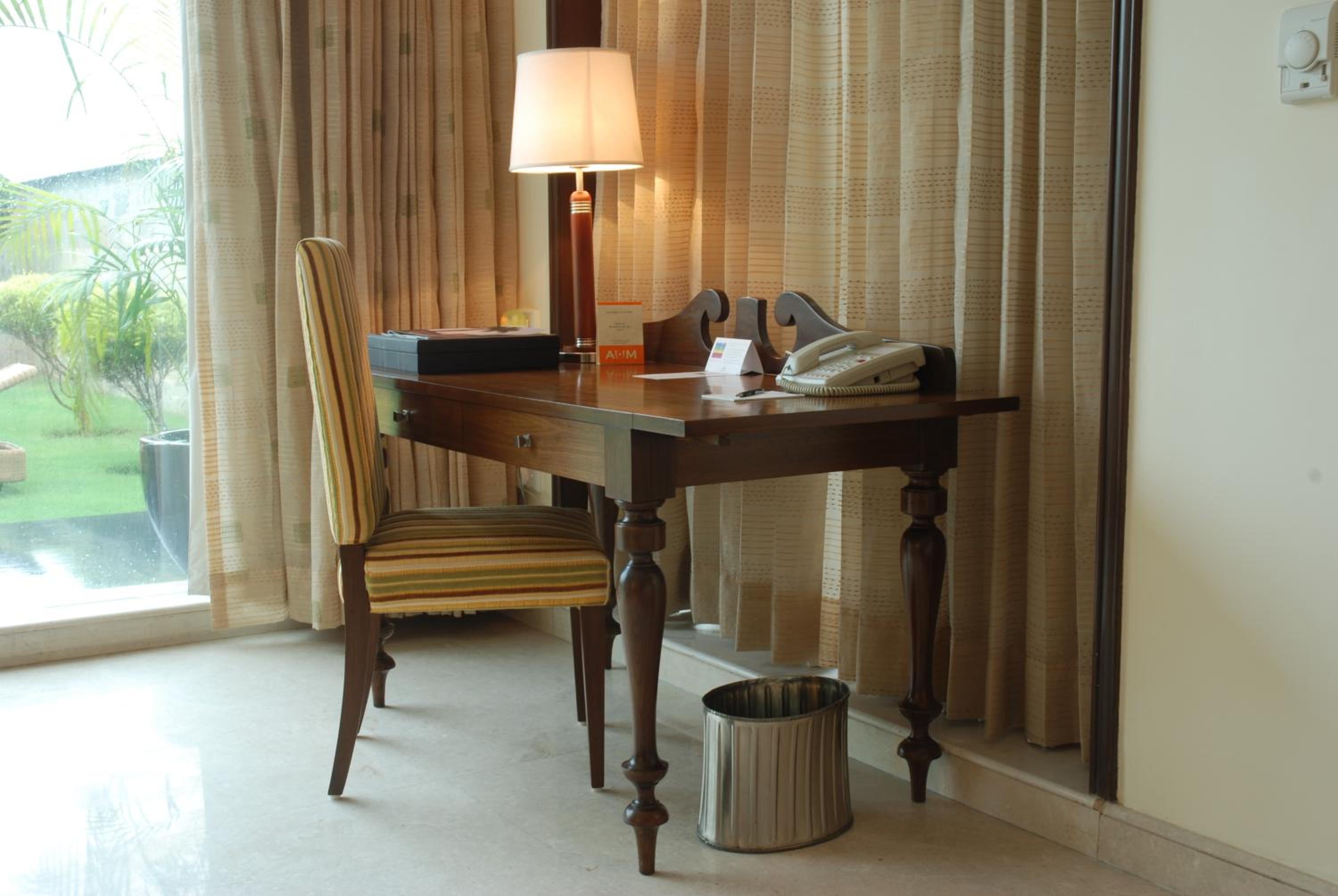 Lalit Garden view Twin Bed (Complimentary Welcome Drink on arrival,15% off on session of couple's Spa,15% off on session of couple's Spa, 15% off on Food & Beverage services, 15% Off on Laundry service for upto 20 clothing item)