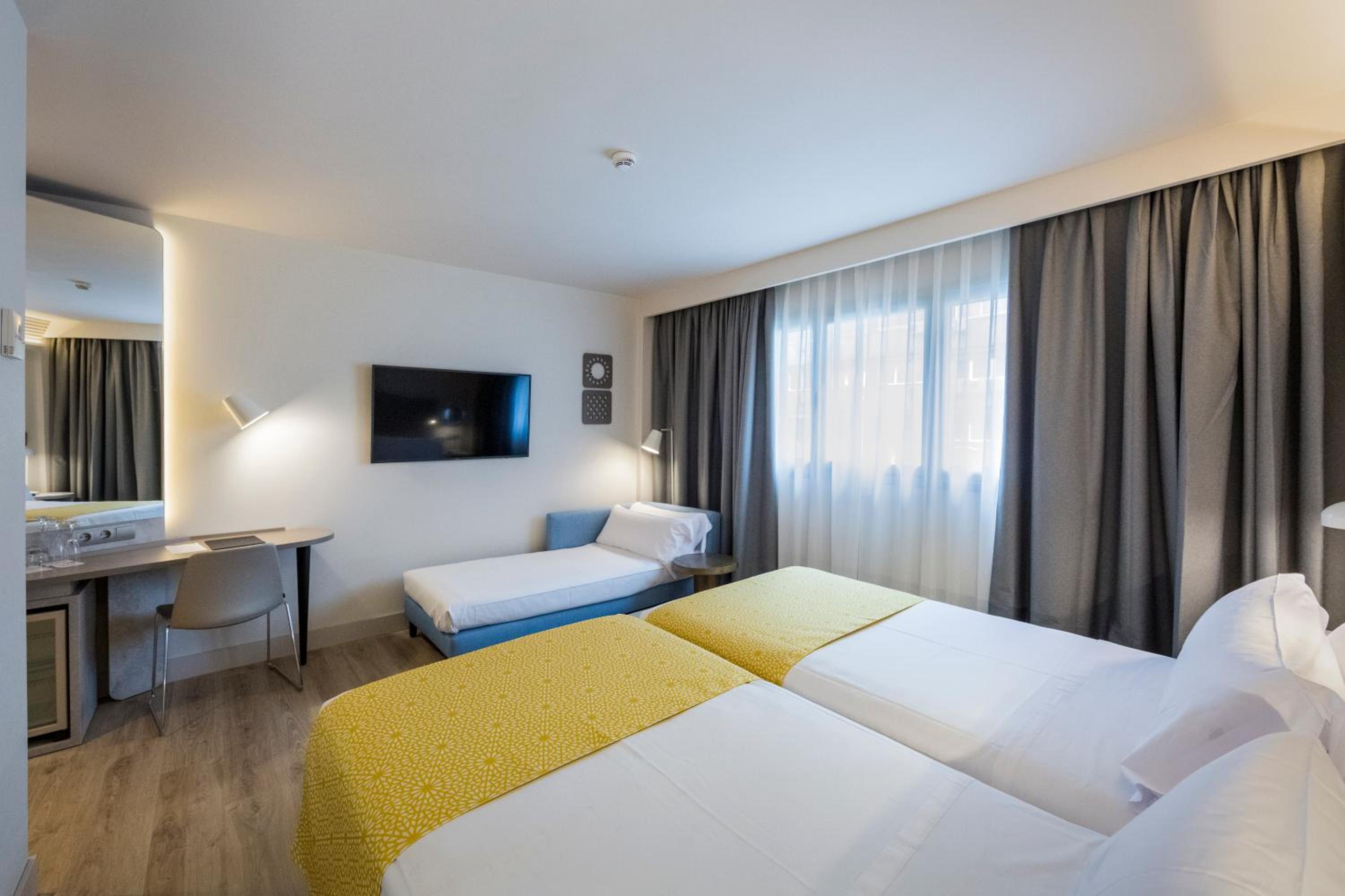 Triple Room - Photo 1