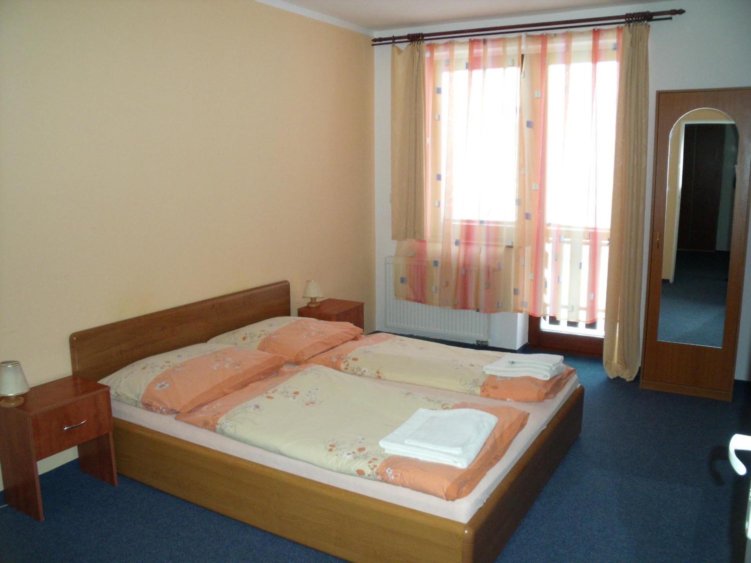 Quadruple Room with Balcony - Photo 1