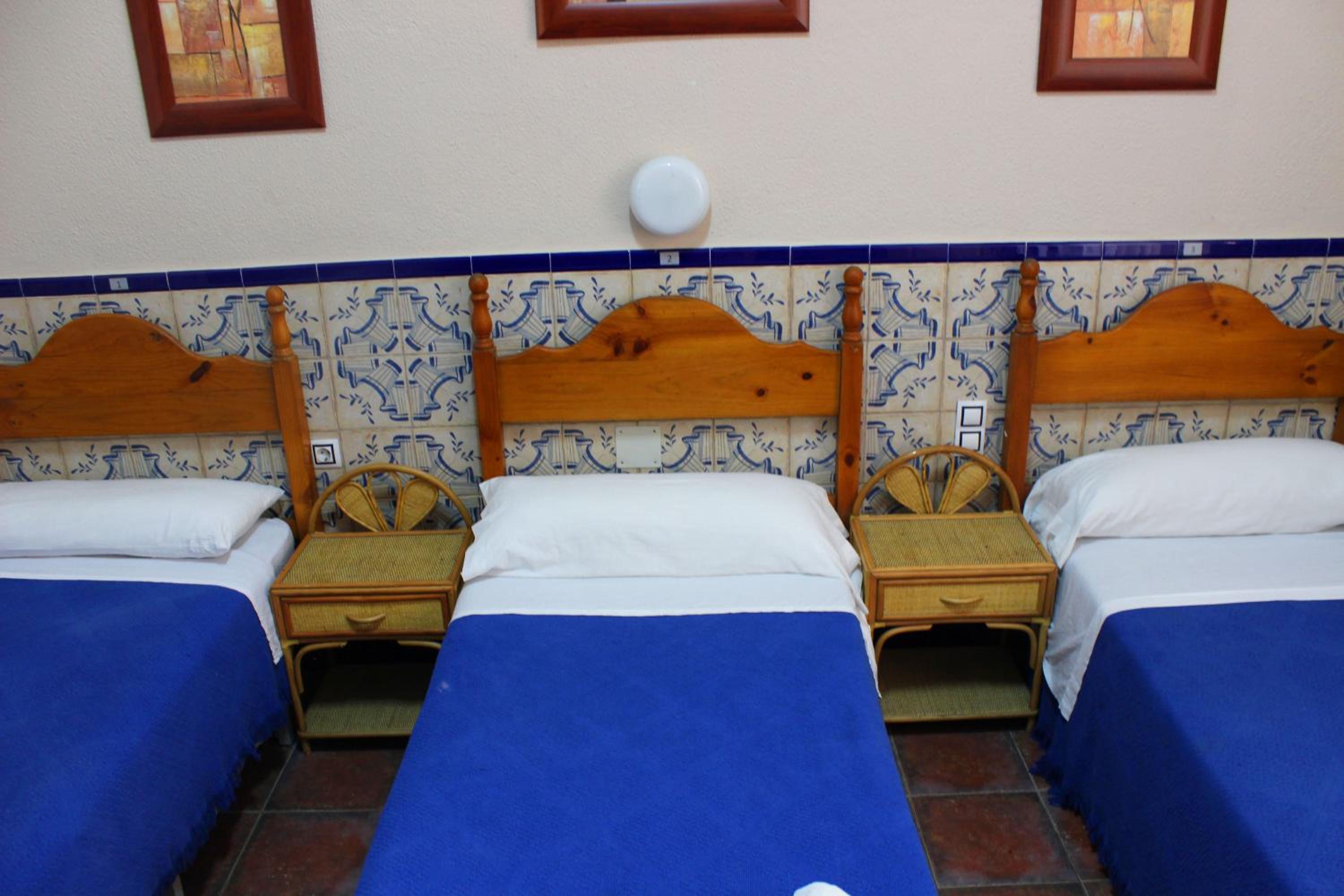 Habitación Cuádruple con Baño Privado
