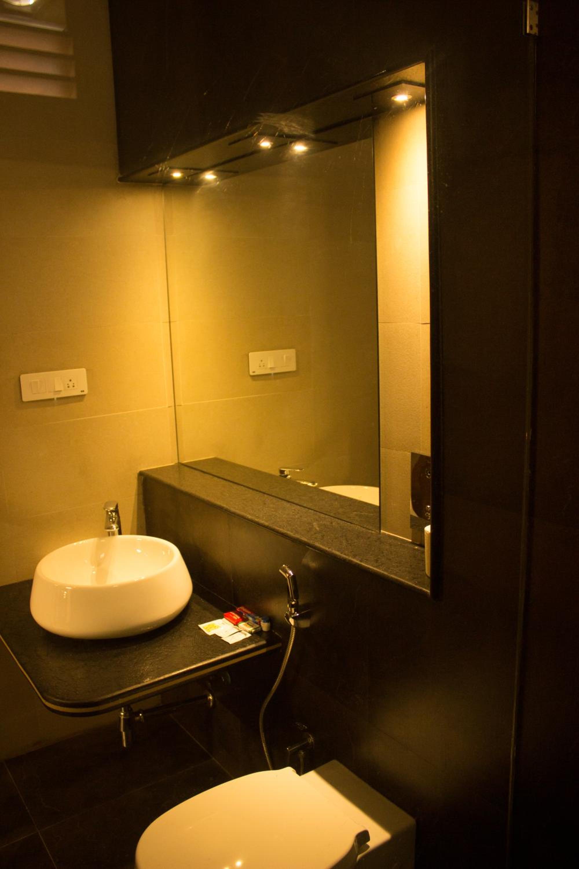 Deluxe Triple Room - Photo 17