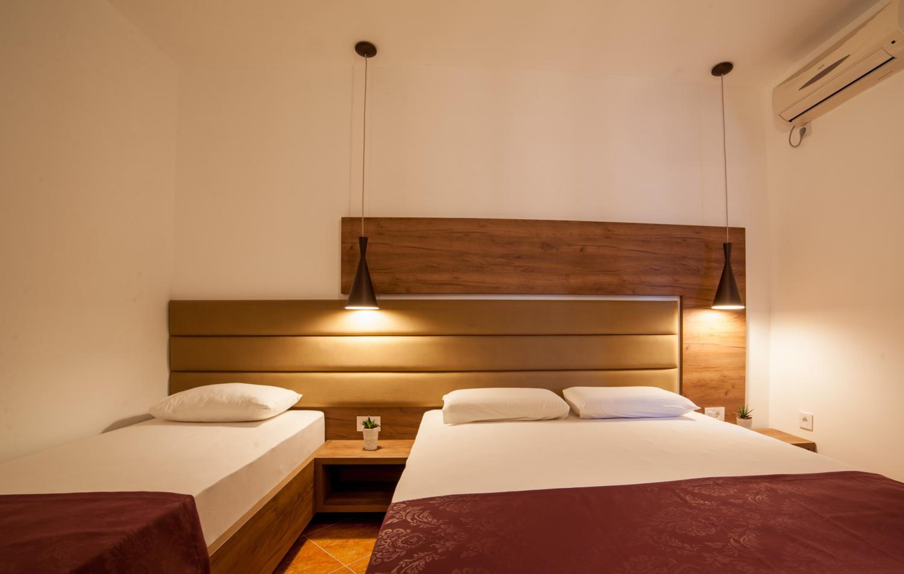 Deluxe Triple Room with Balcony and Garden View photo 2