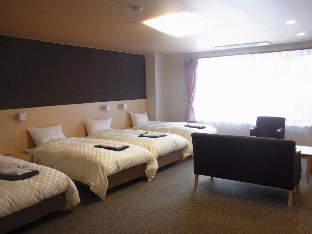Quadruple Room - Non-Smoking - Photo 1