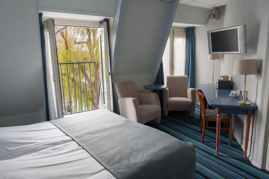 Standard Twin Room - Photo 4