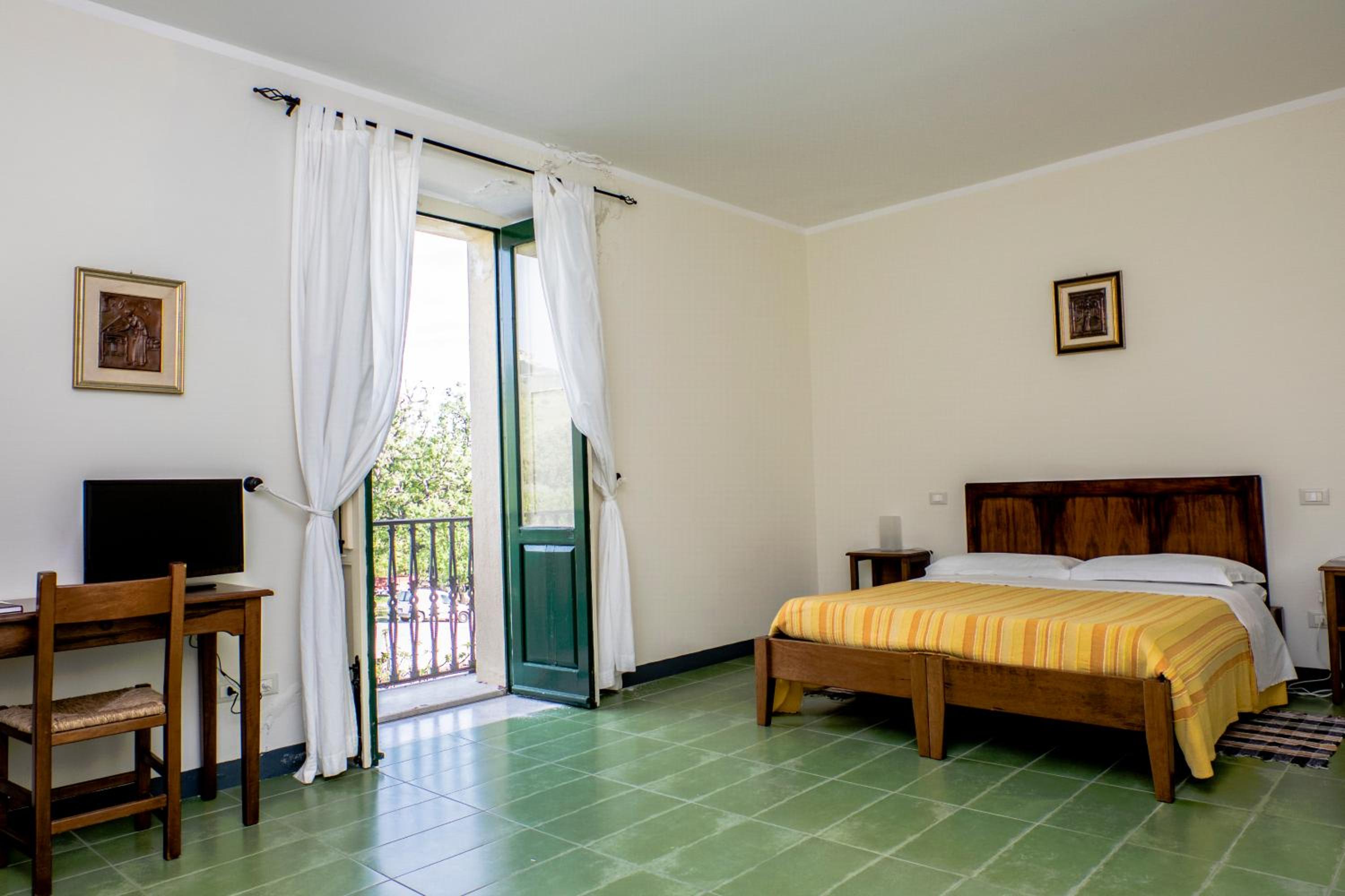 Quadruple Room - Photo 1