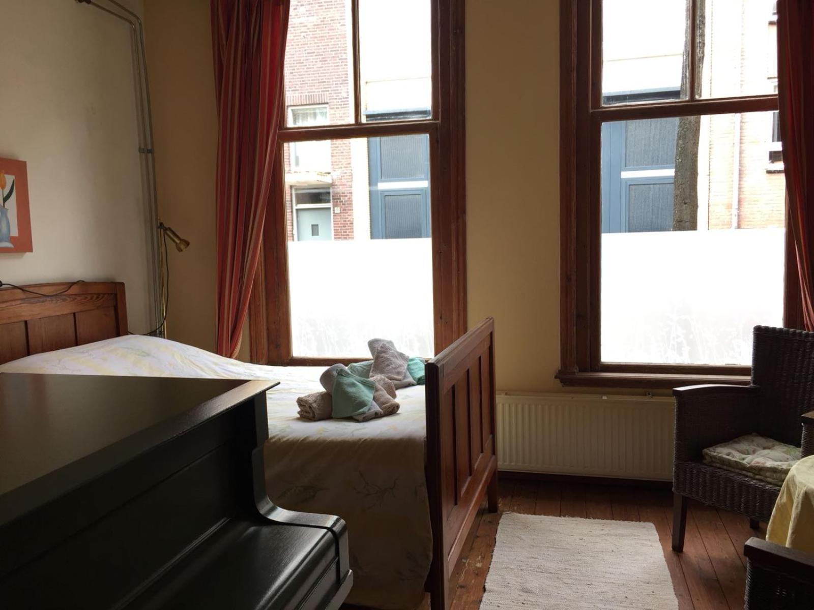 Basic Triple Room With Shared Bathroom photo 2