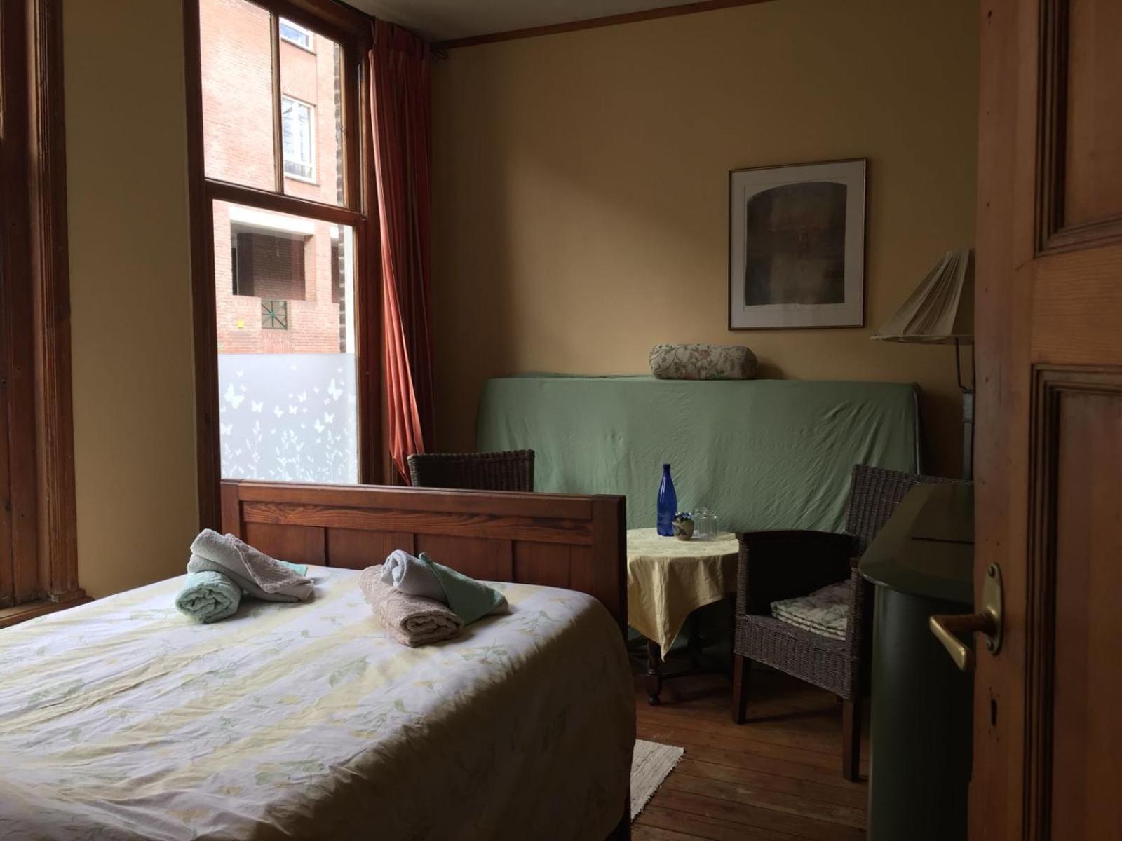 Basic Triple Room With Shared Bathroom photo 1