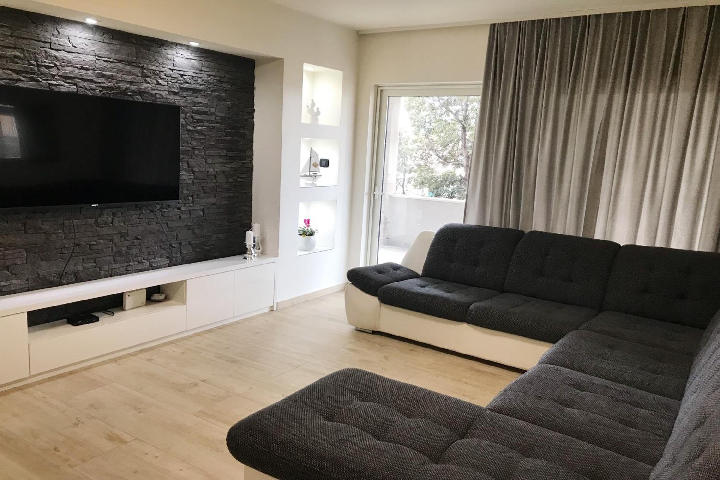 Three-Bedroom Apartment photo 1